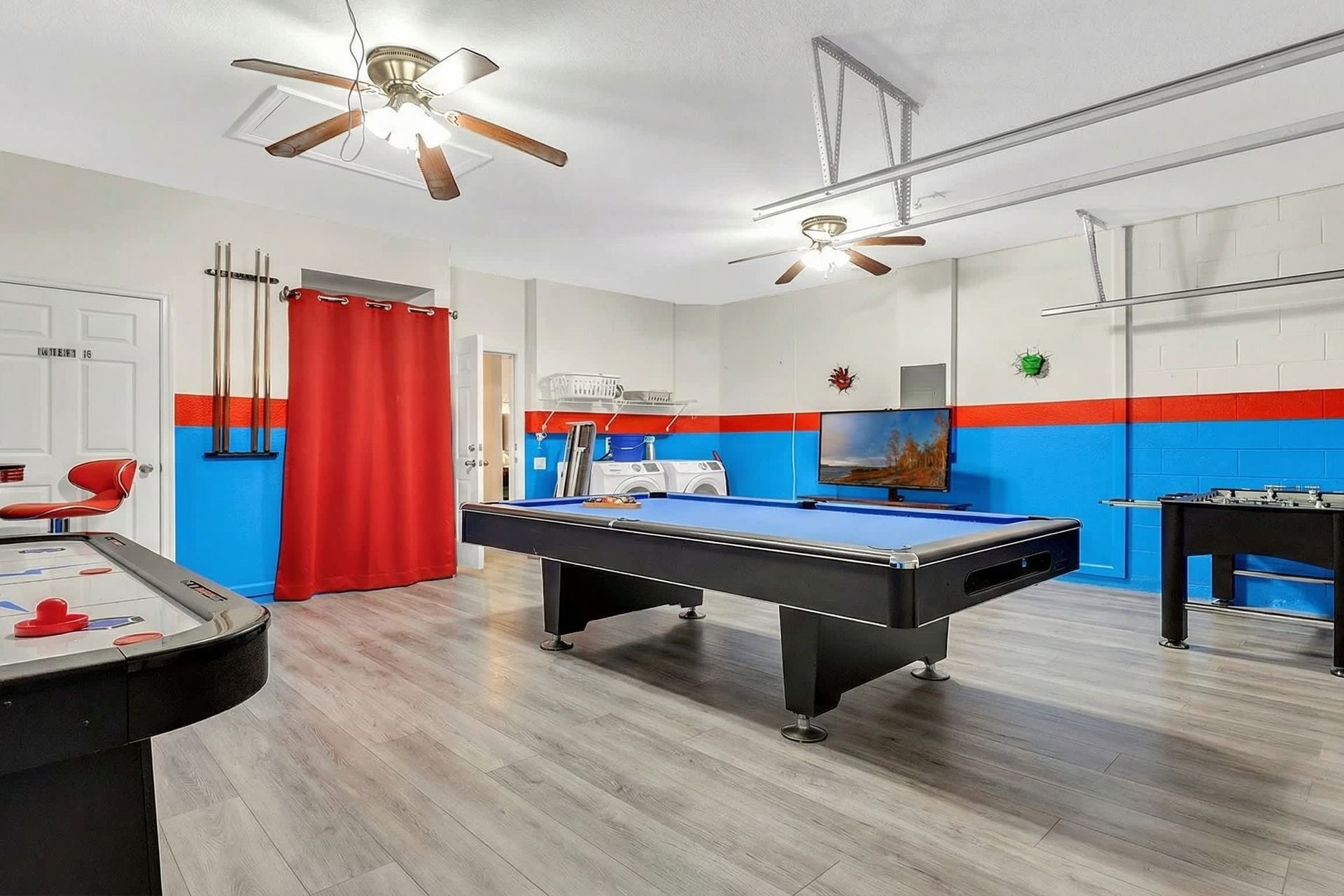 Indulge your inner fun in our game room, offering you a delightful way to unwind and have fun.