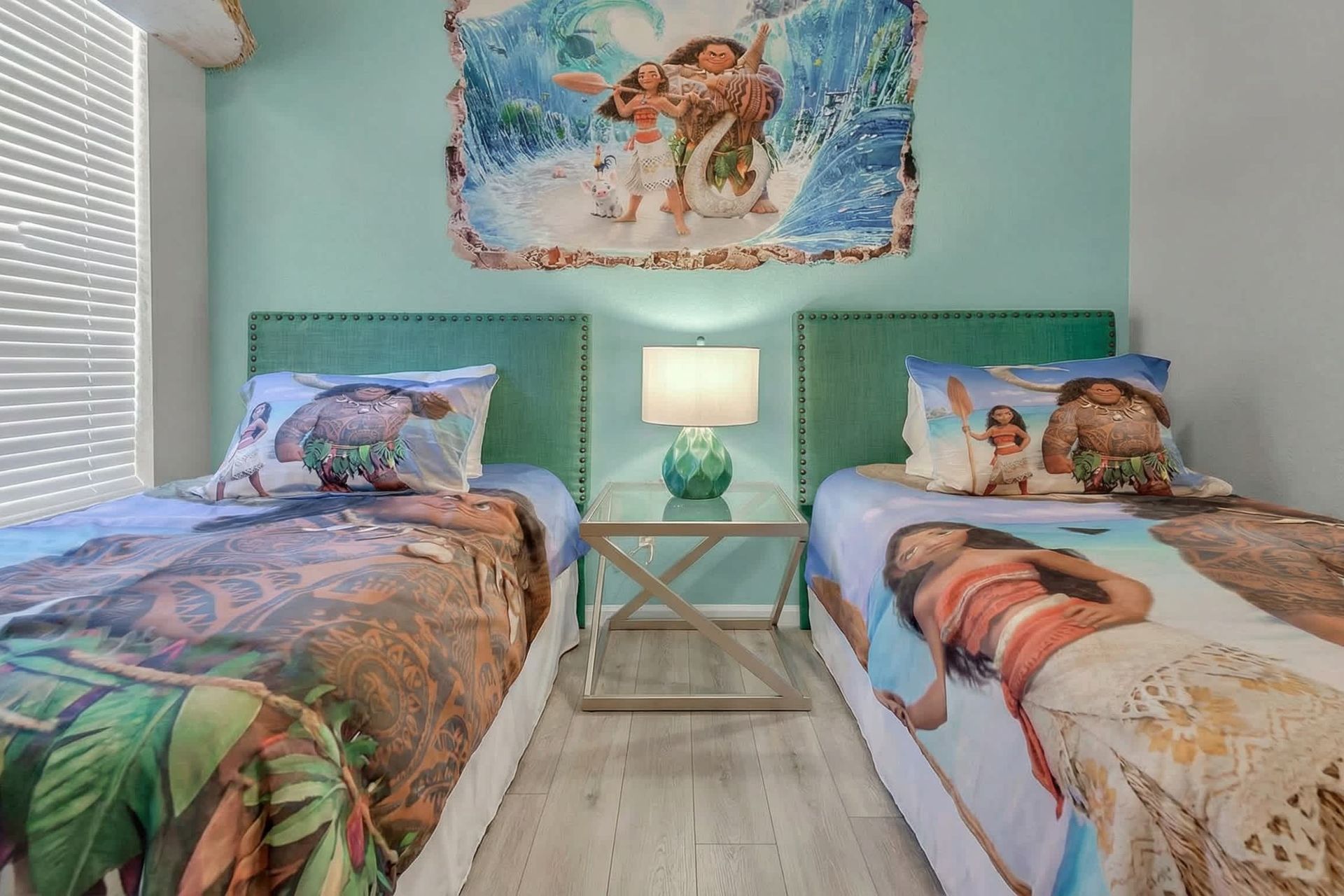 Experience a comfortable stay in our Moana inspired room with two twin beds, offering you the perfect space to relax and recharge after a day of adventure.