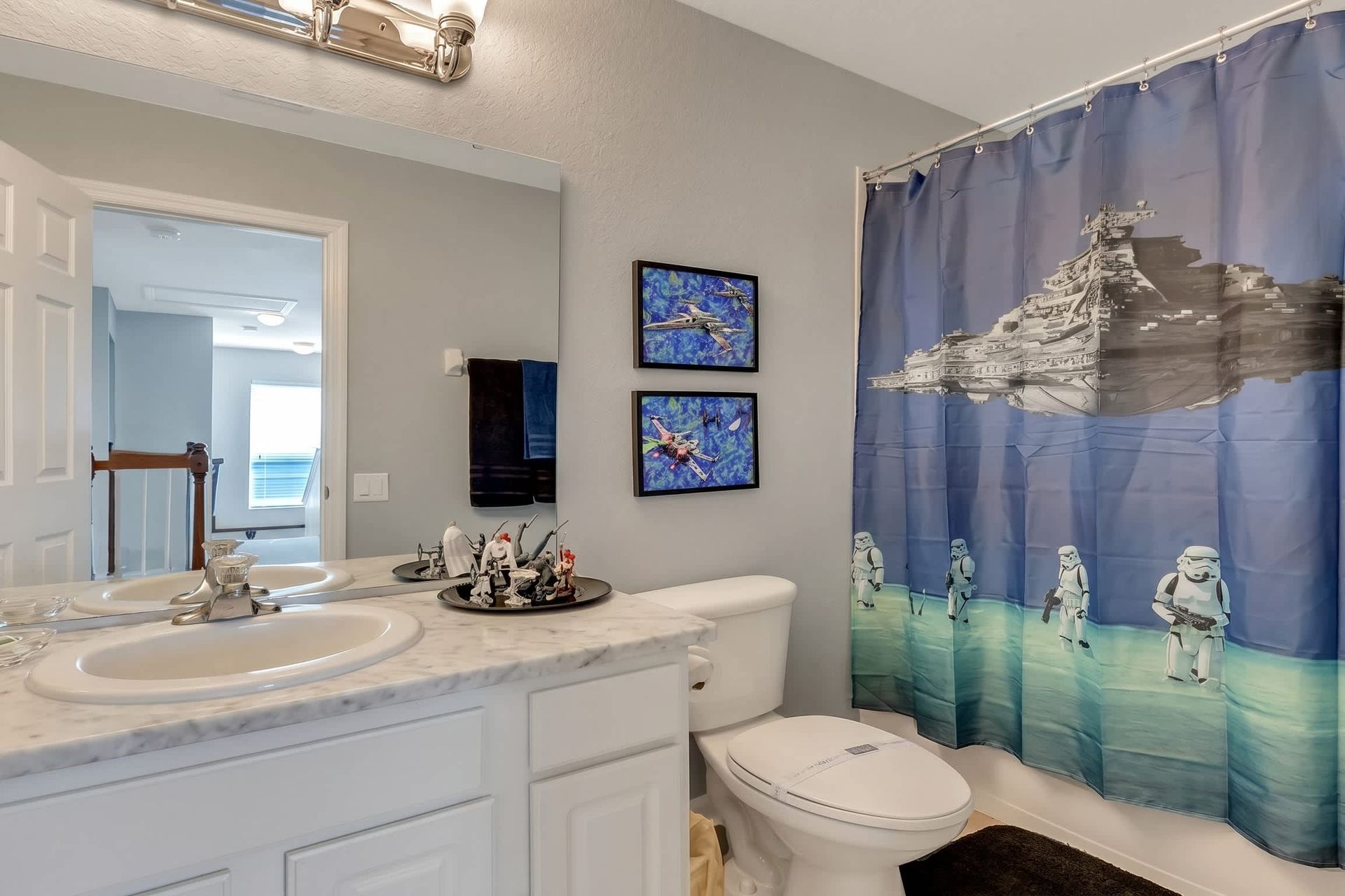 Indulge in luxury in our Star Wars inspired bathroom, providing you with all the amenities you need for a comfortable stay.