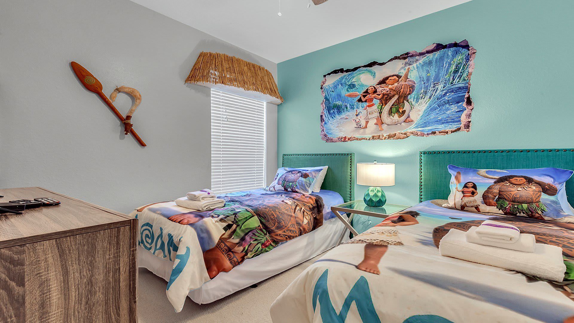 Relax in comfort in our Moana Themed room with two twin beds, offering you a convenient and inviting space to make the most of your stay.