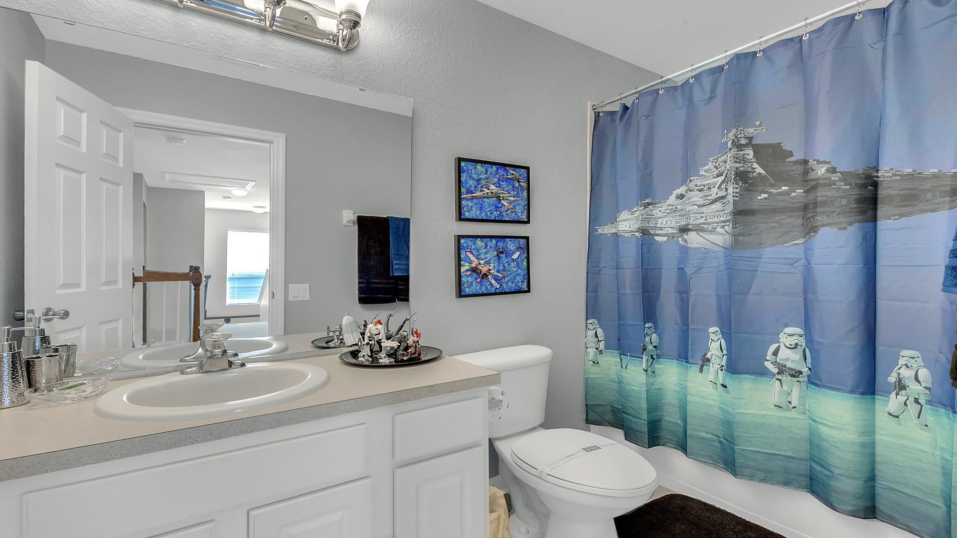 Indulge in luxury in our Star Wars inspired bathroom, providing you with all the amenities you need for a comfortable stay.