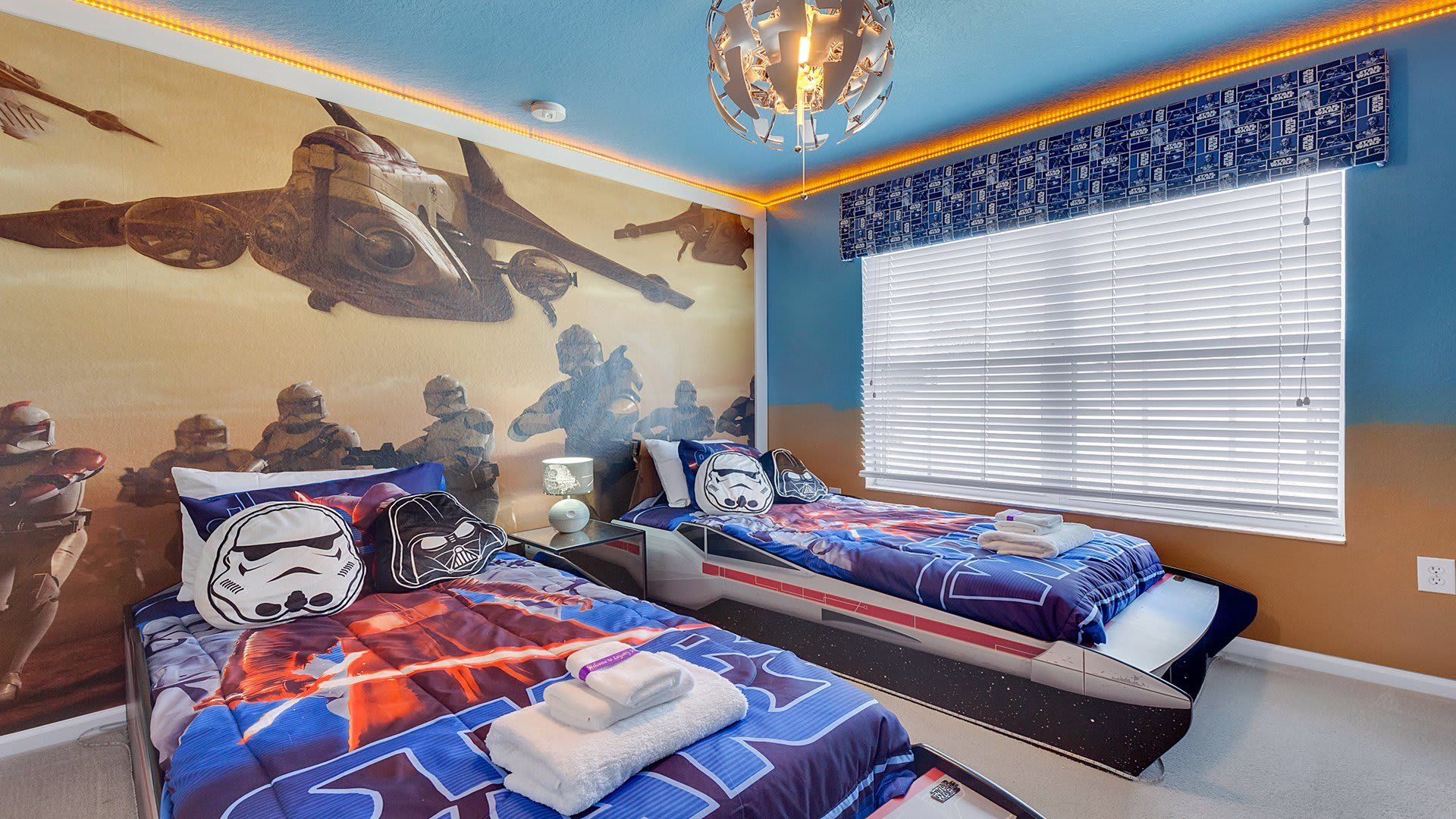 Enjoy the flexibility and comfort of our Star Wars Themed room with two twin beds, providing you with a cozy and restful retreat during your stay.