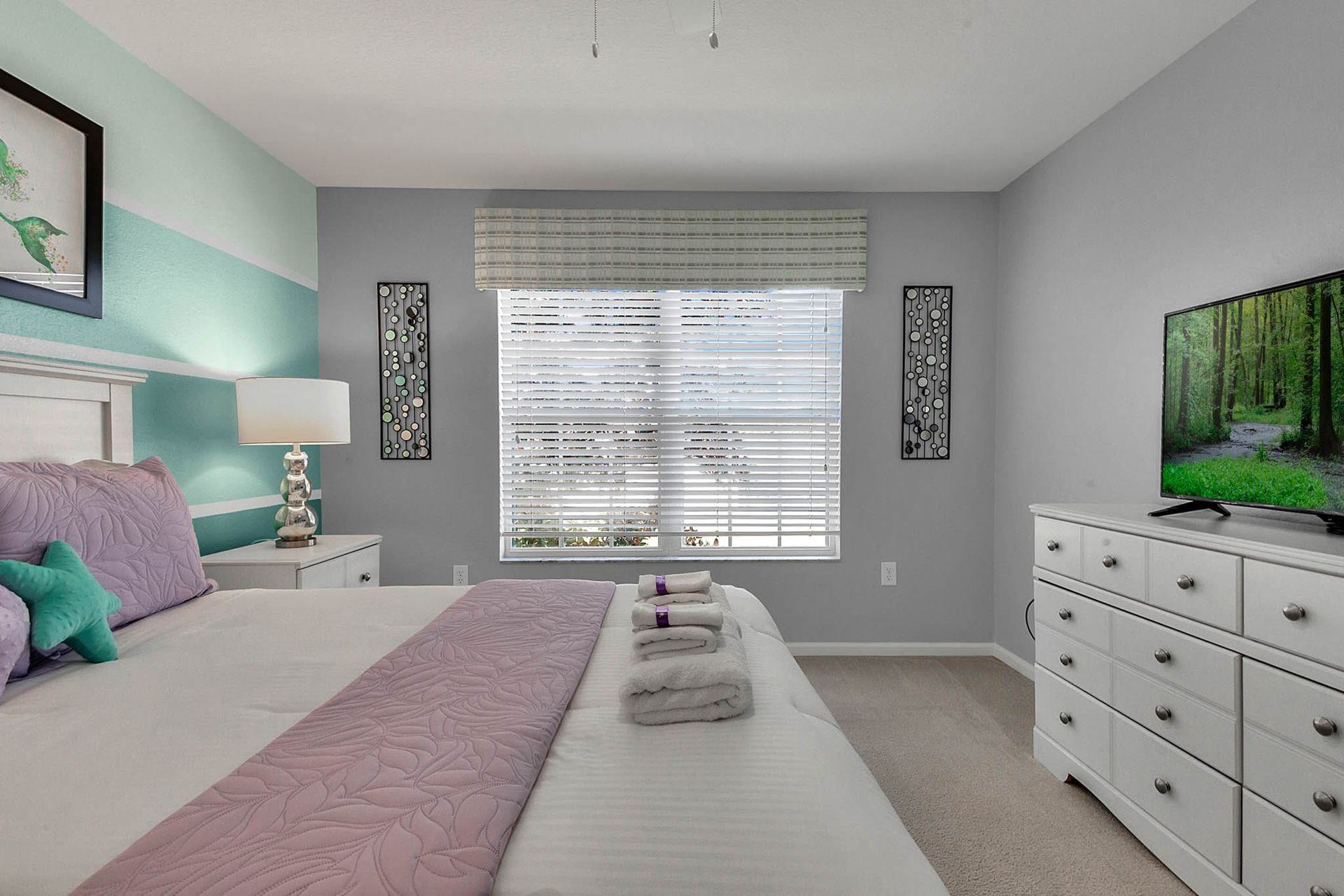 Enjoy a blissful night's sleep in our plush bedroom, designed for your utmost comfort.