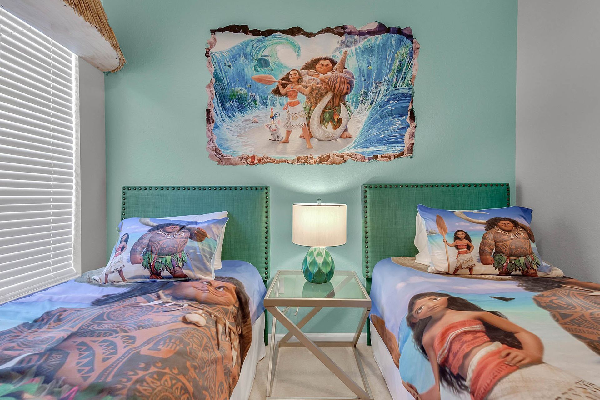 Experience a comfortable stay in our Moana inspired room with two twin beds, offering you the perfect space to relax and recharge after a day of adventure.