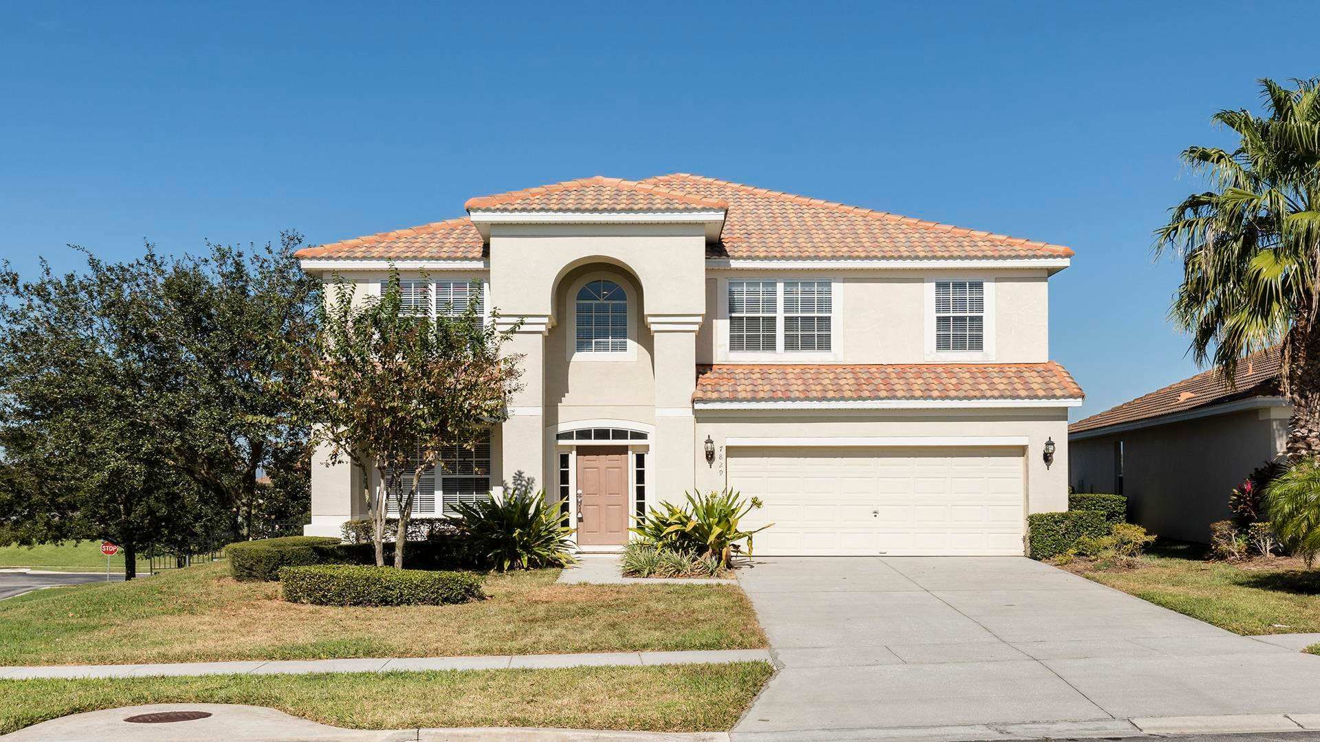 Stunning villa, spacious interiors, family-friendly amenities, lush surroundings.