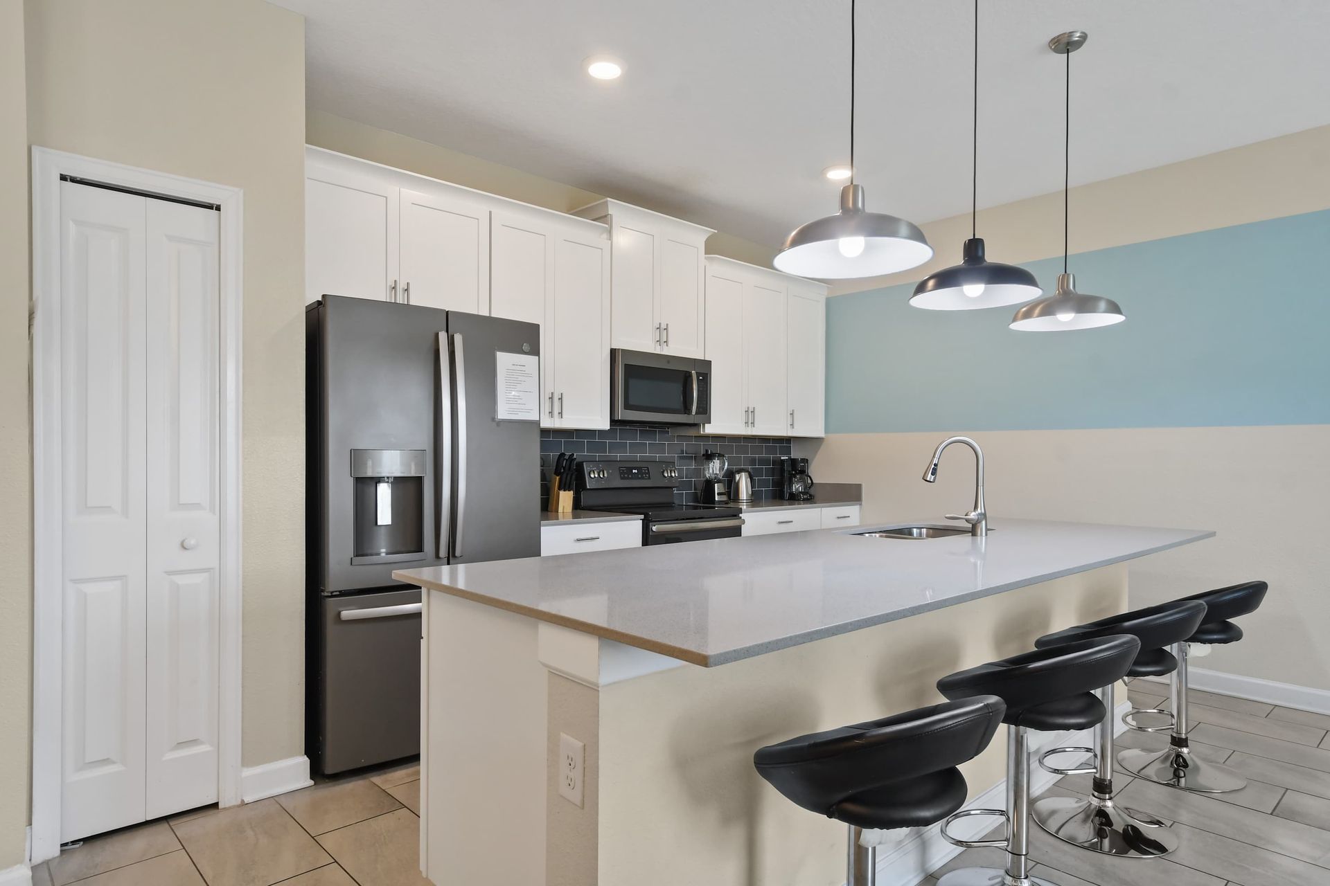 Unleash your inner chef in our modern kitchen, complete with top-of-the-line appliances for your convenience.