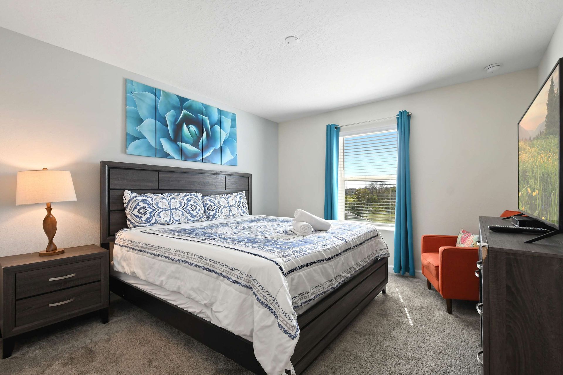 Relax in style in our elegant king bedroom, offering you a comfortable retreat after a day of exploration.