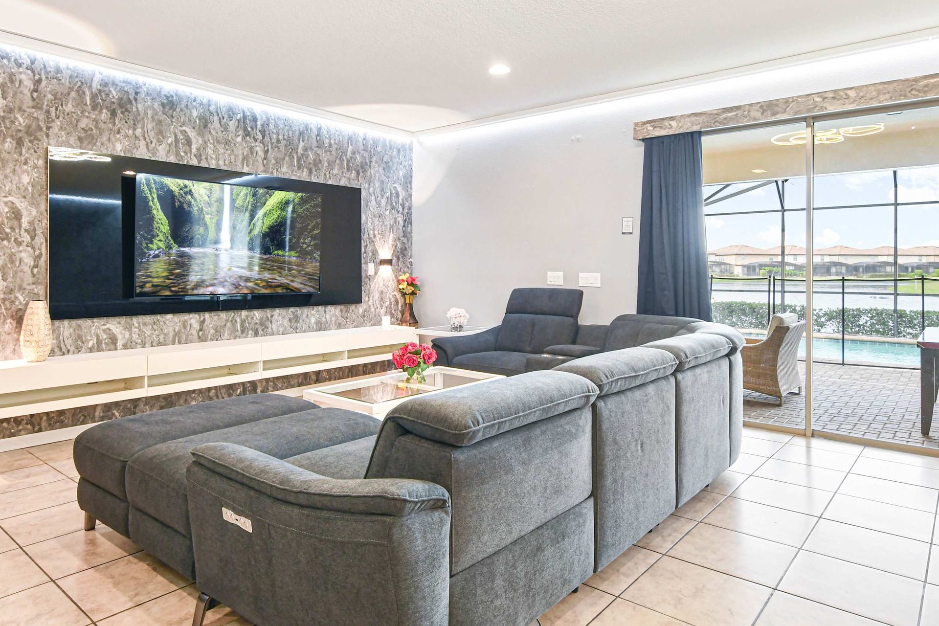 Cozy living room with modern decor and lake views—relax in style!