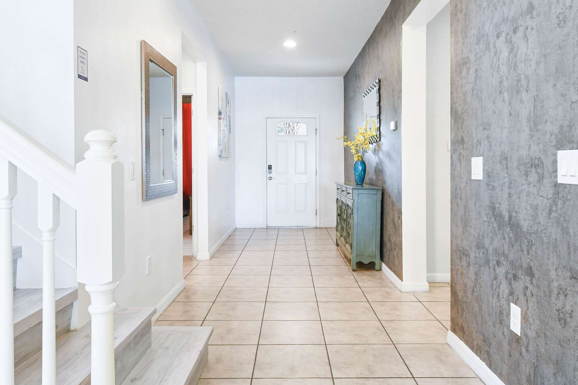 Bright entryway with modern decor and inviting ambiance.