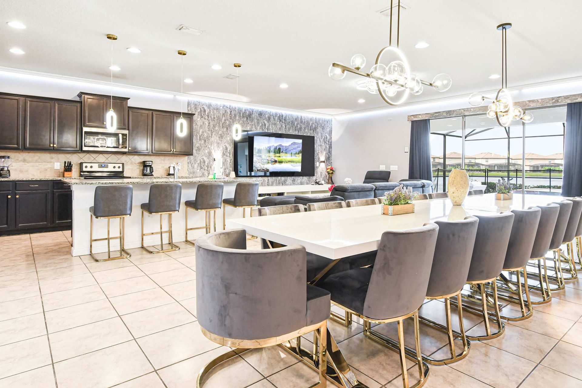 Modern kitchen and dining combo with elegant seating and open layout!