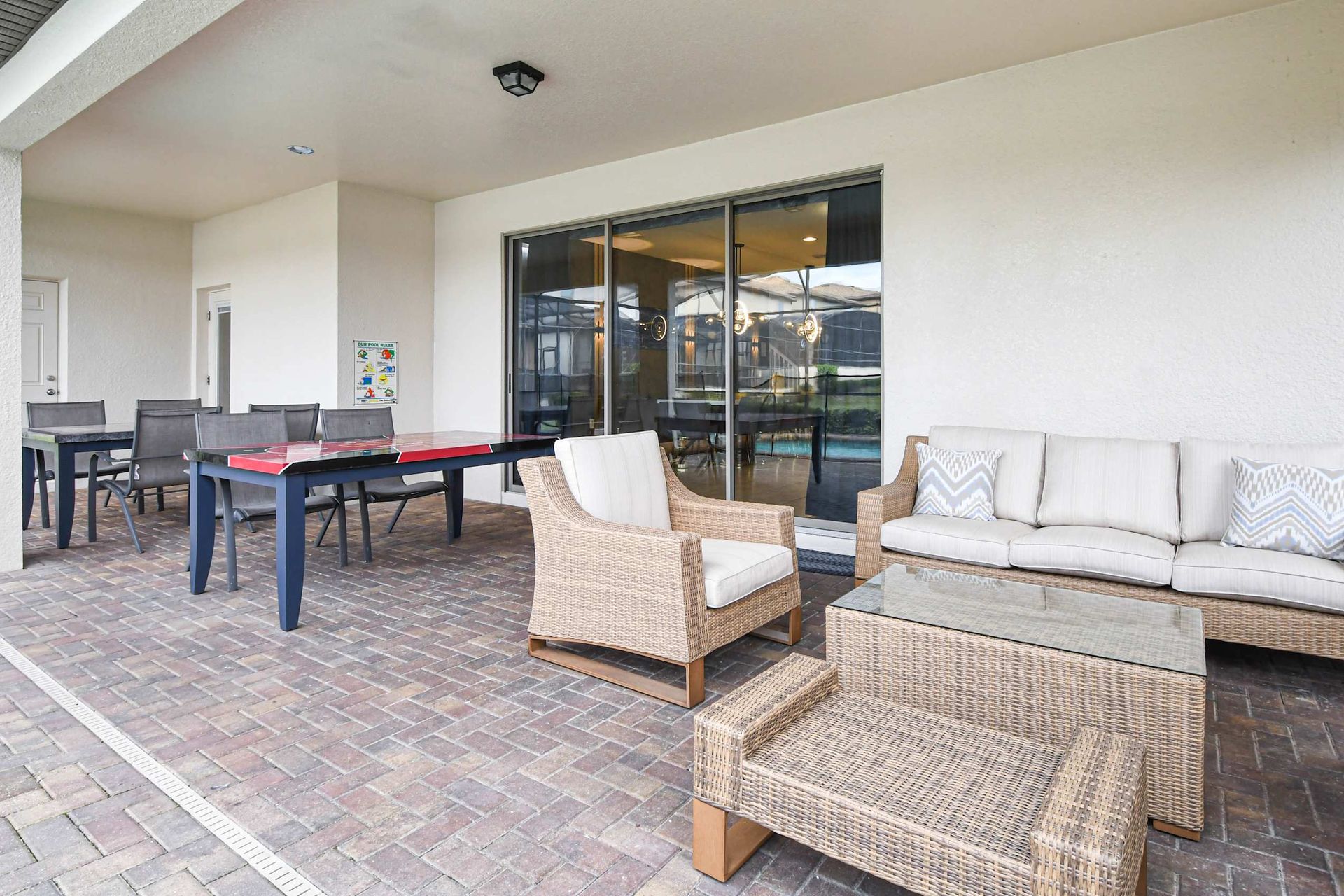 Cozy outdoor seating area, ideal for relaxing or dining al fresco!