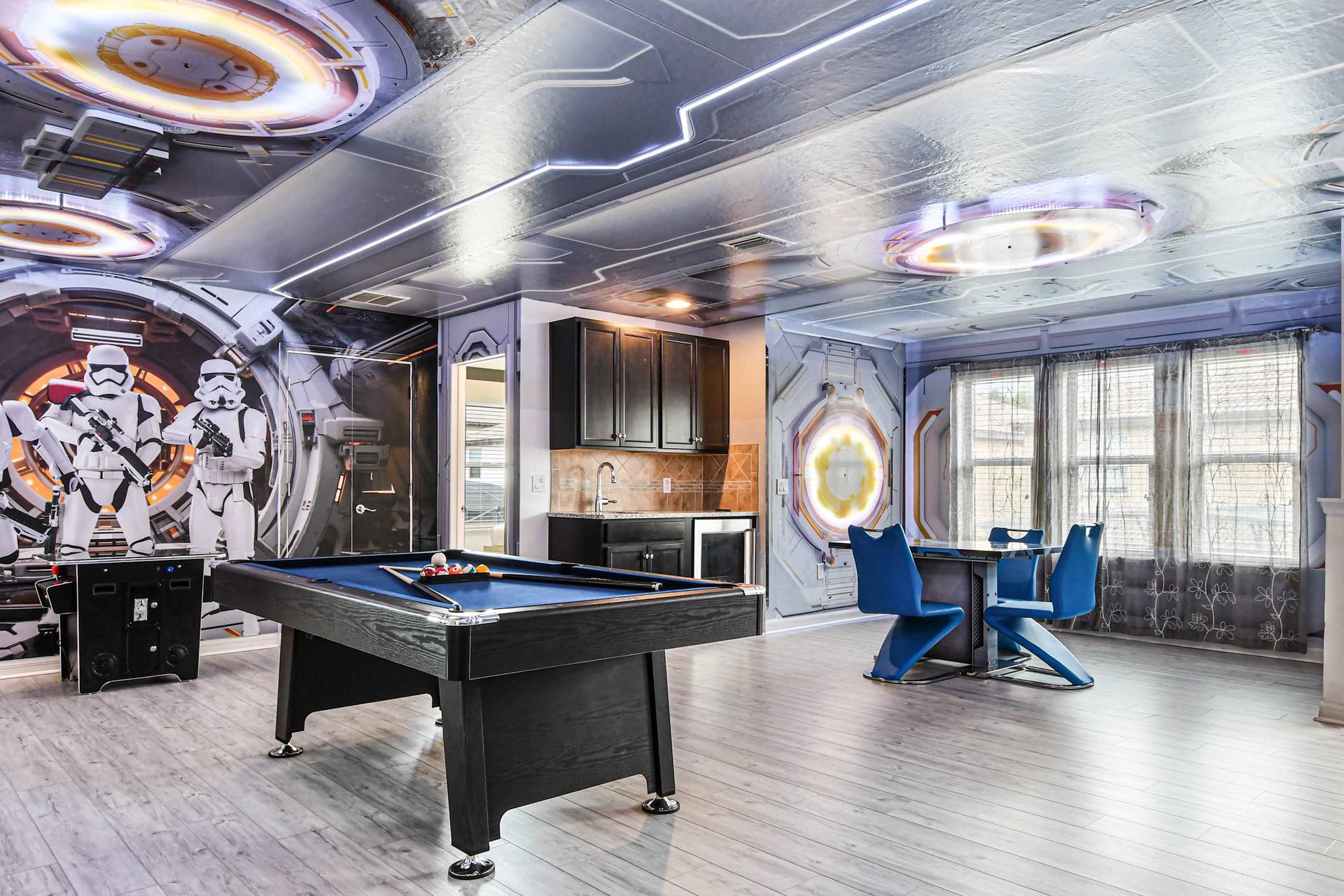 Star Wars-themed game room with pool table and arcade fun!