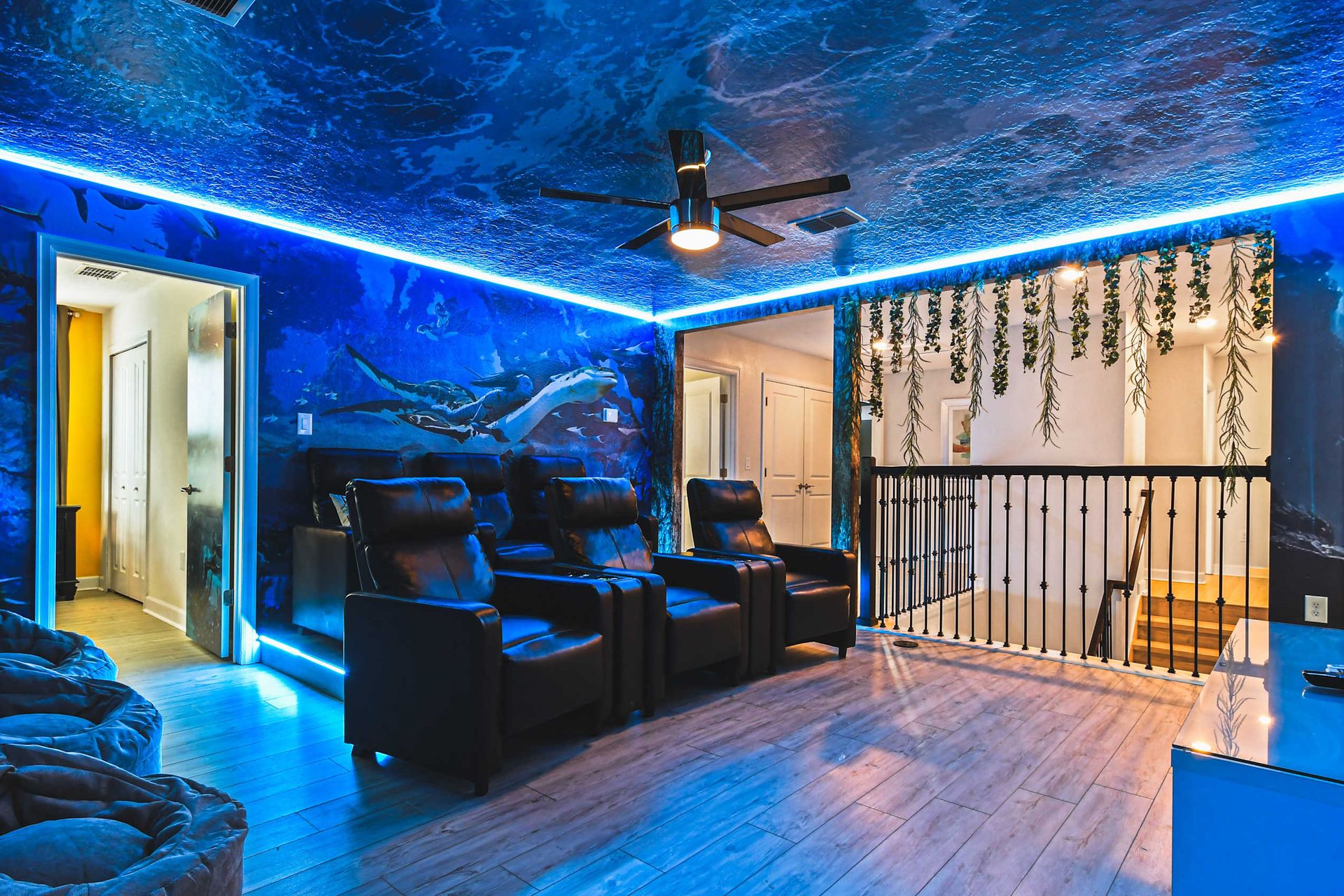 Avatar-themed theater room, immersed in water-inspired ambiance