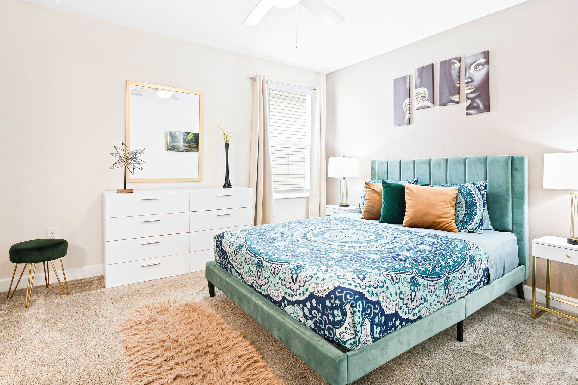 Chic bedroom with vibrant decor, plush bedding, and modern furnishings for a cozy and stylish retreat