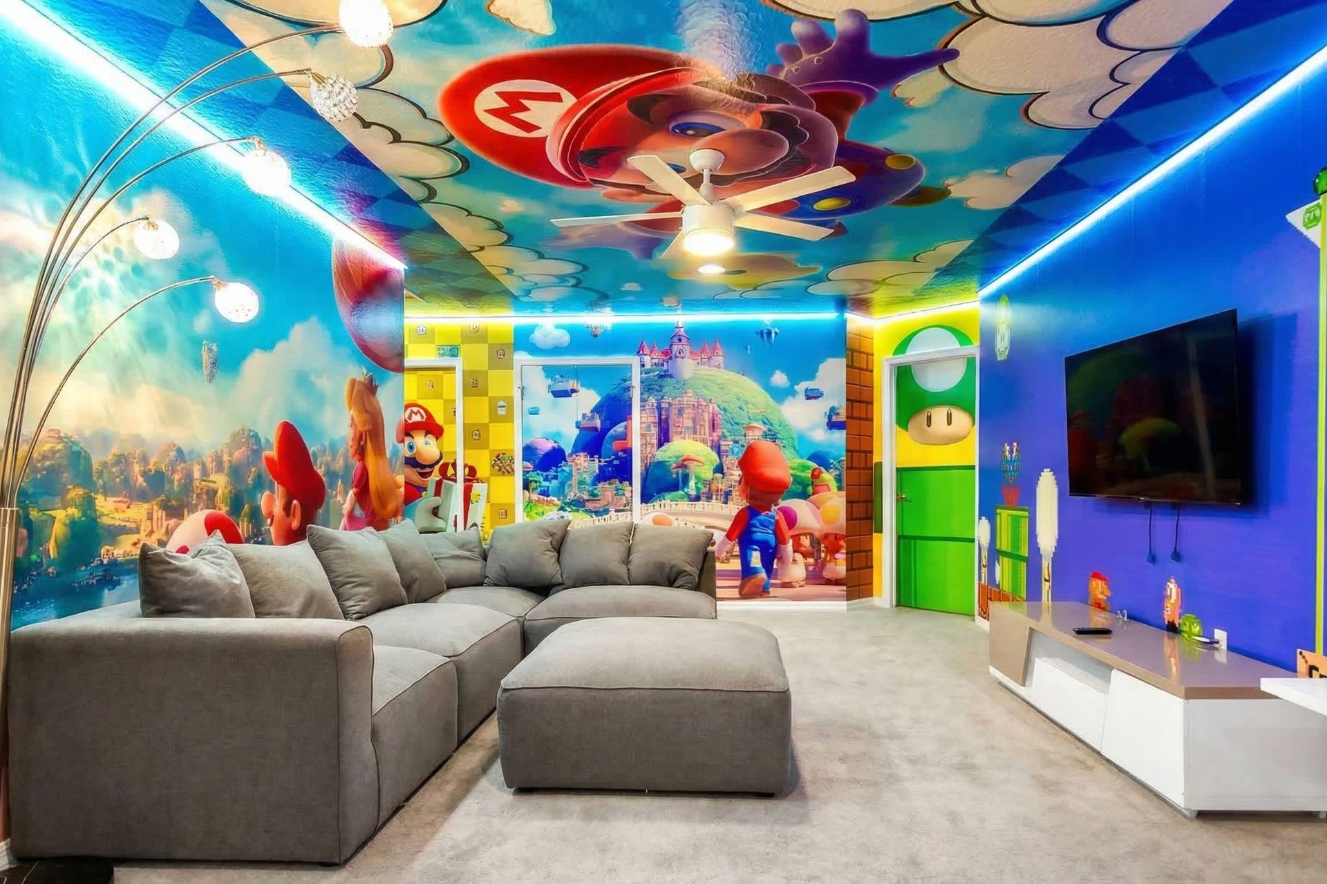Colorful game lounge with themed walls, cozy seating, and fun for all ages.
