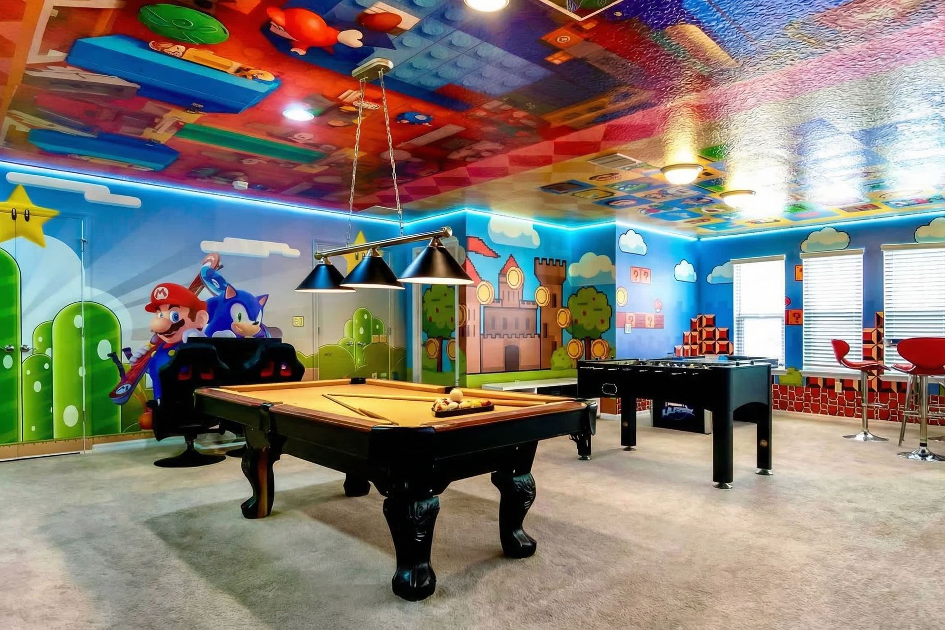 Epic themed game room with pool, foosball, and arcade-style fun for everyone.