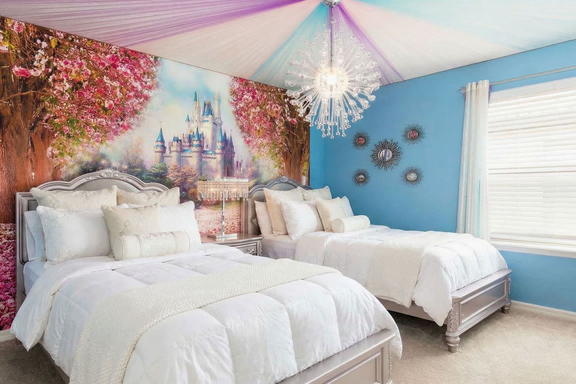 Whimsical princess bedroom with castle mural, chic decor & twin beds!