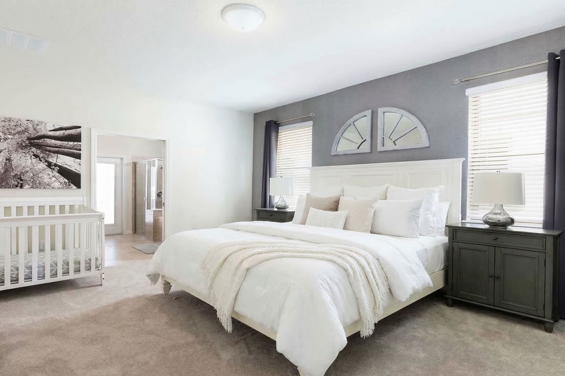 Charming master suite with king bed, nursery space, and en-suite!