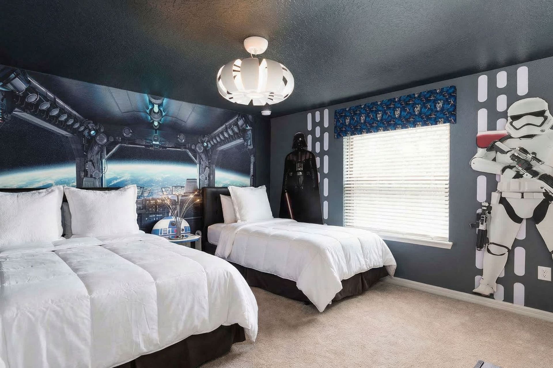 Space-themed twin bedroom with galactic decor and epic vibes!