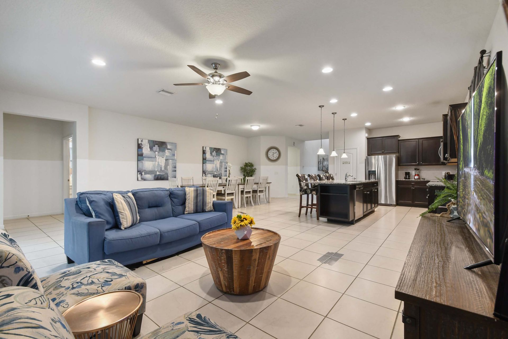 Open-concept living with a modern kitchen, spacious seating, and cozy decor.