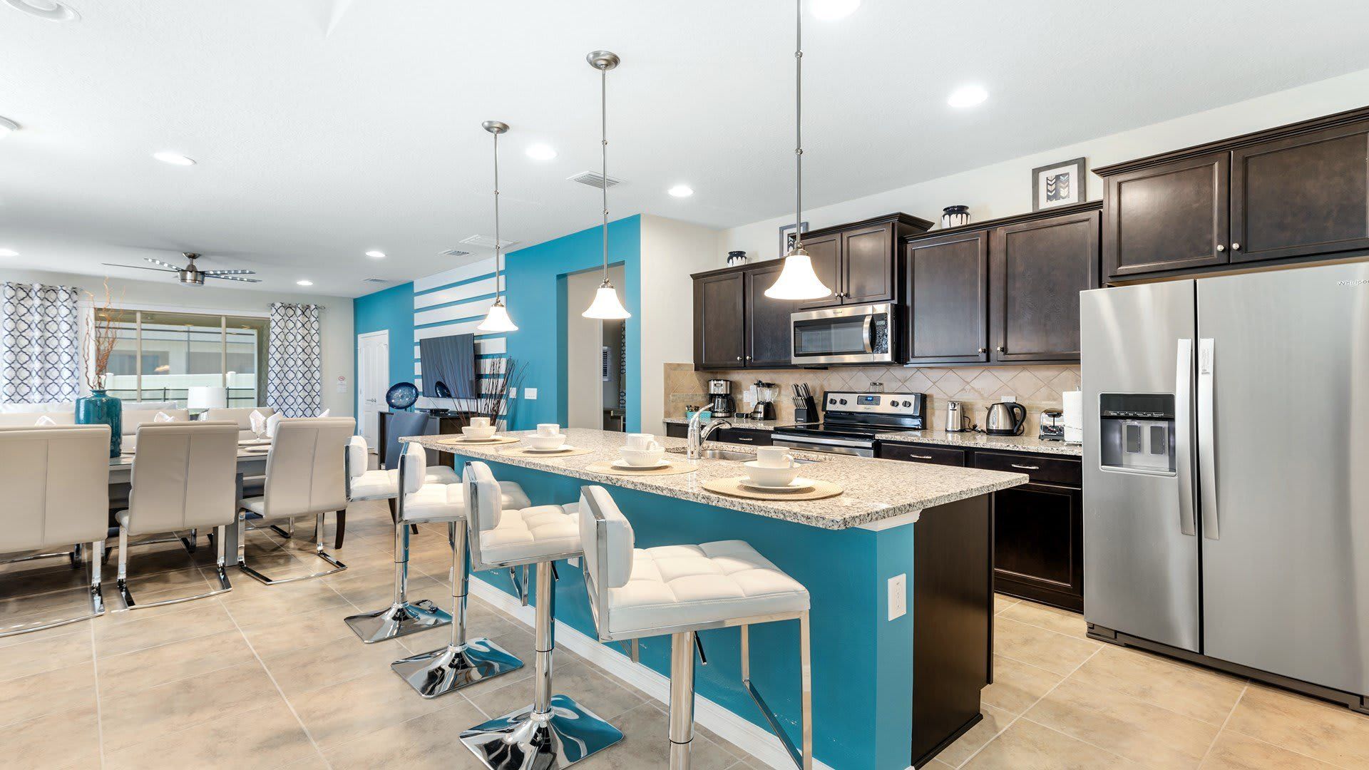 Well-equipped kitchen, modern appliances for cooking enthusiasts.