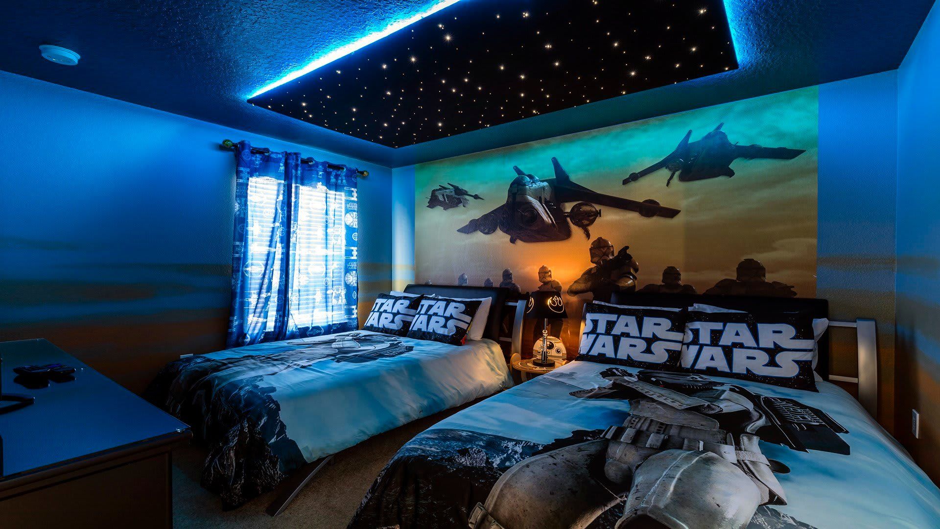 Captivating Star Wars-themed bedroom featuring two beds.