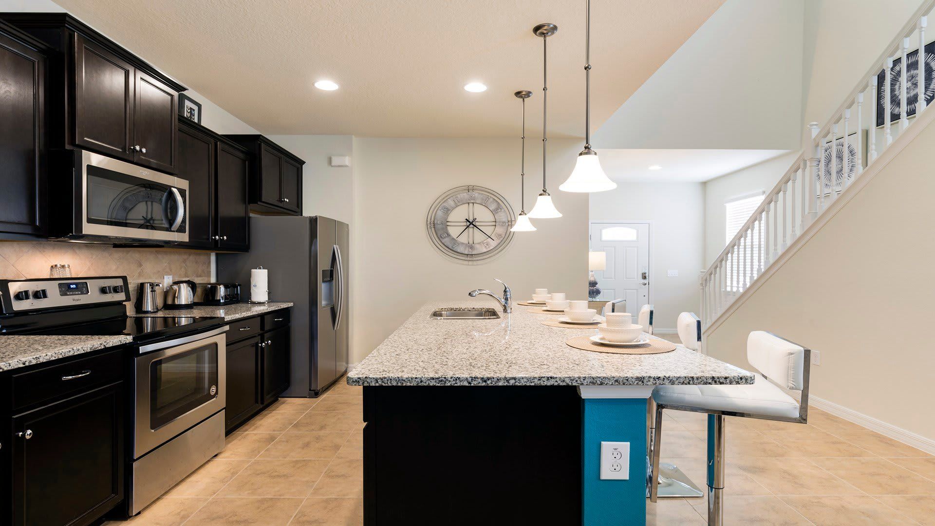 Well-equipped kitchen, modern appliances for cooking enthusiasts.