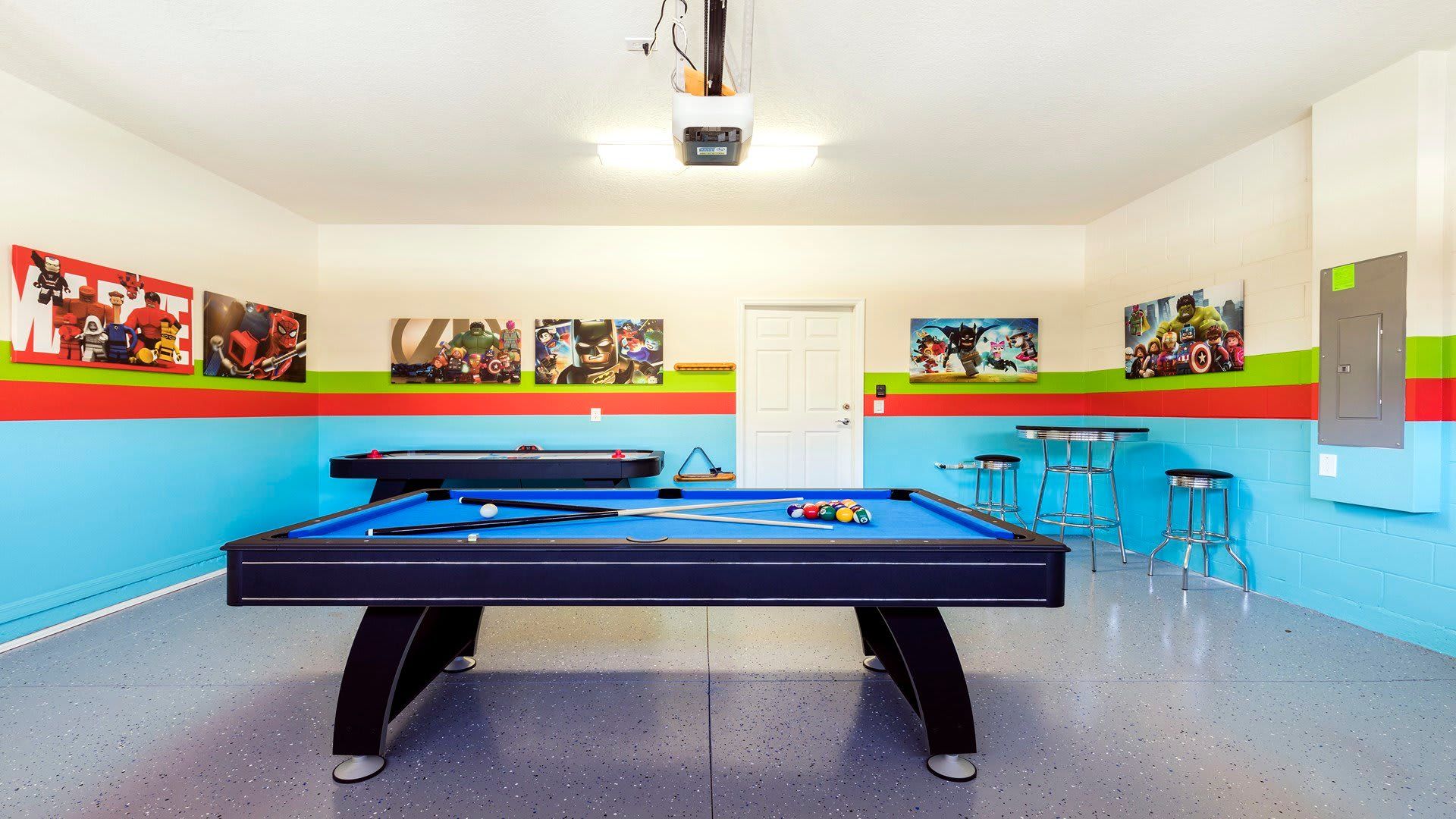Nostalgic retro-grade game room with ample space.