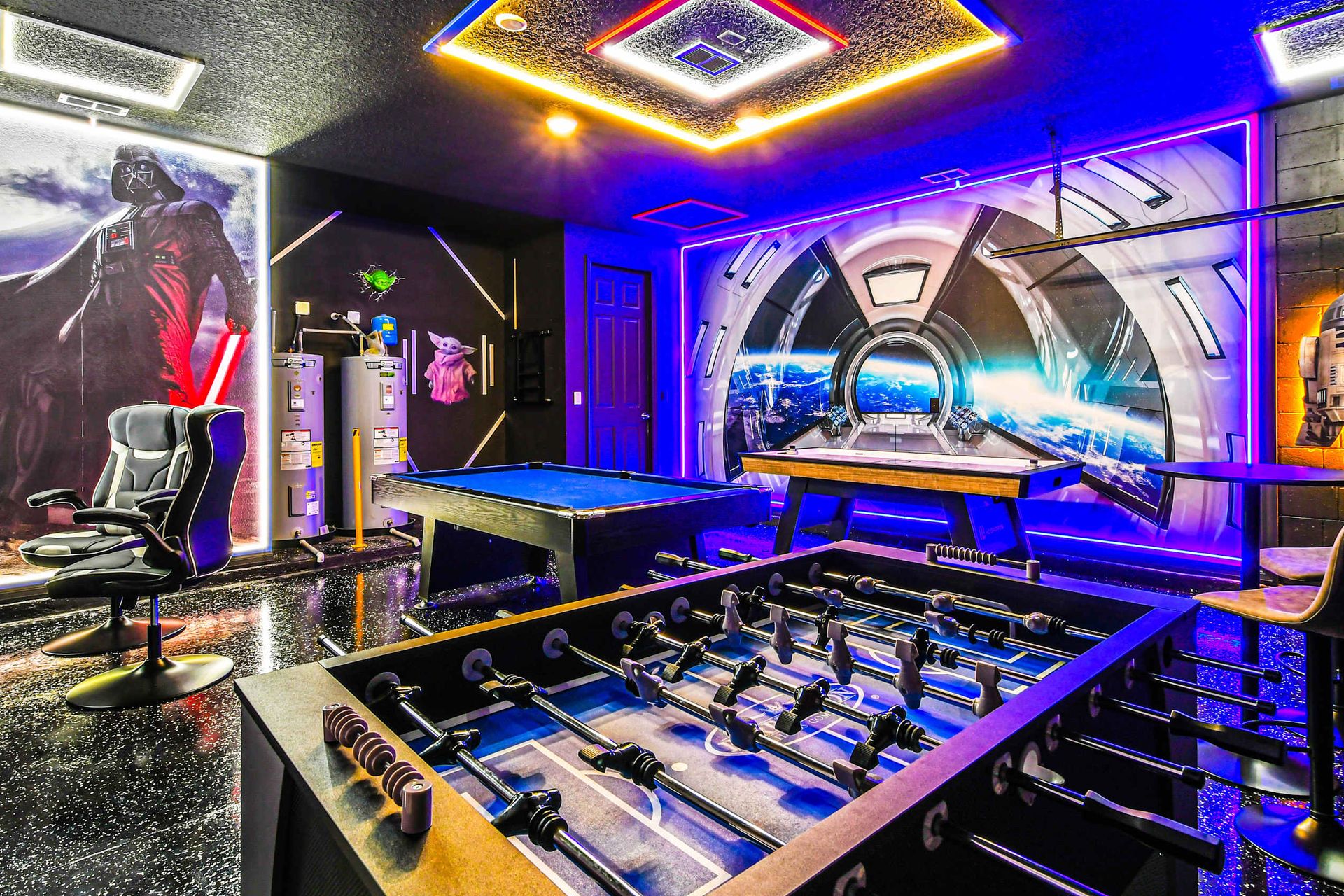 Epic Star Wars-themed game room with pool, foosball & neon vibes!