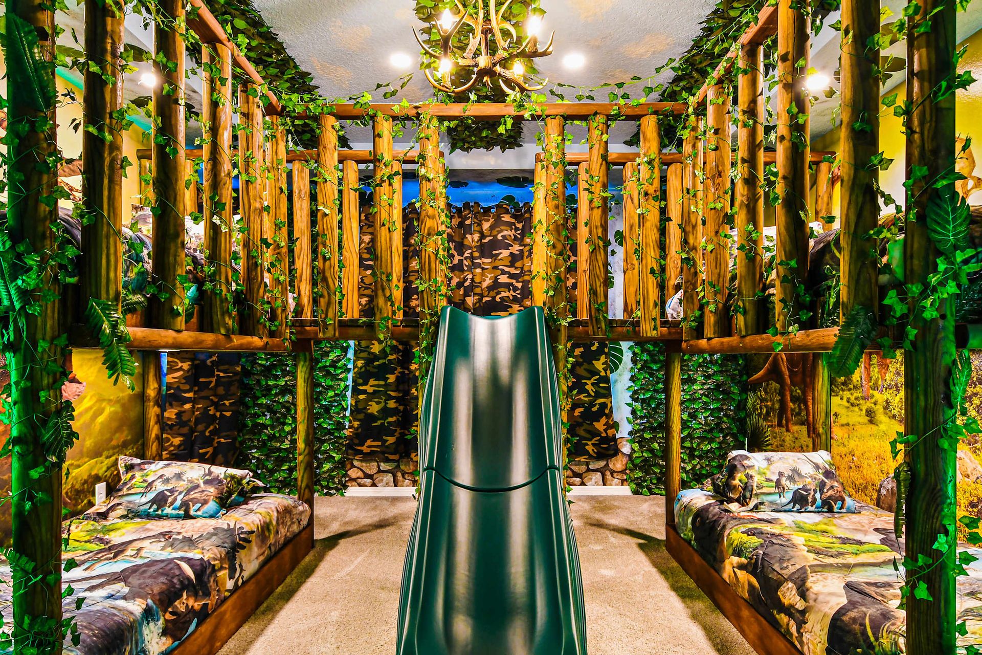 Kids will love the upstairs bedroom with a cool Jurassic World theme and a slide.