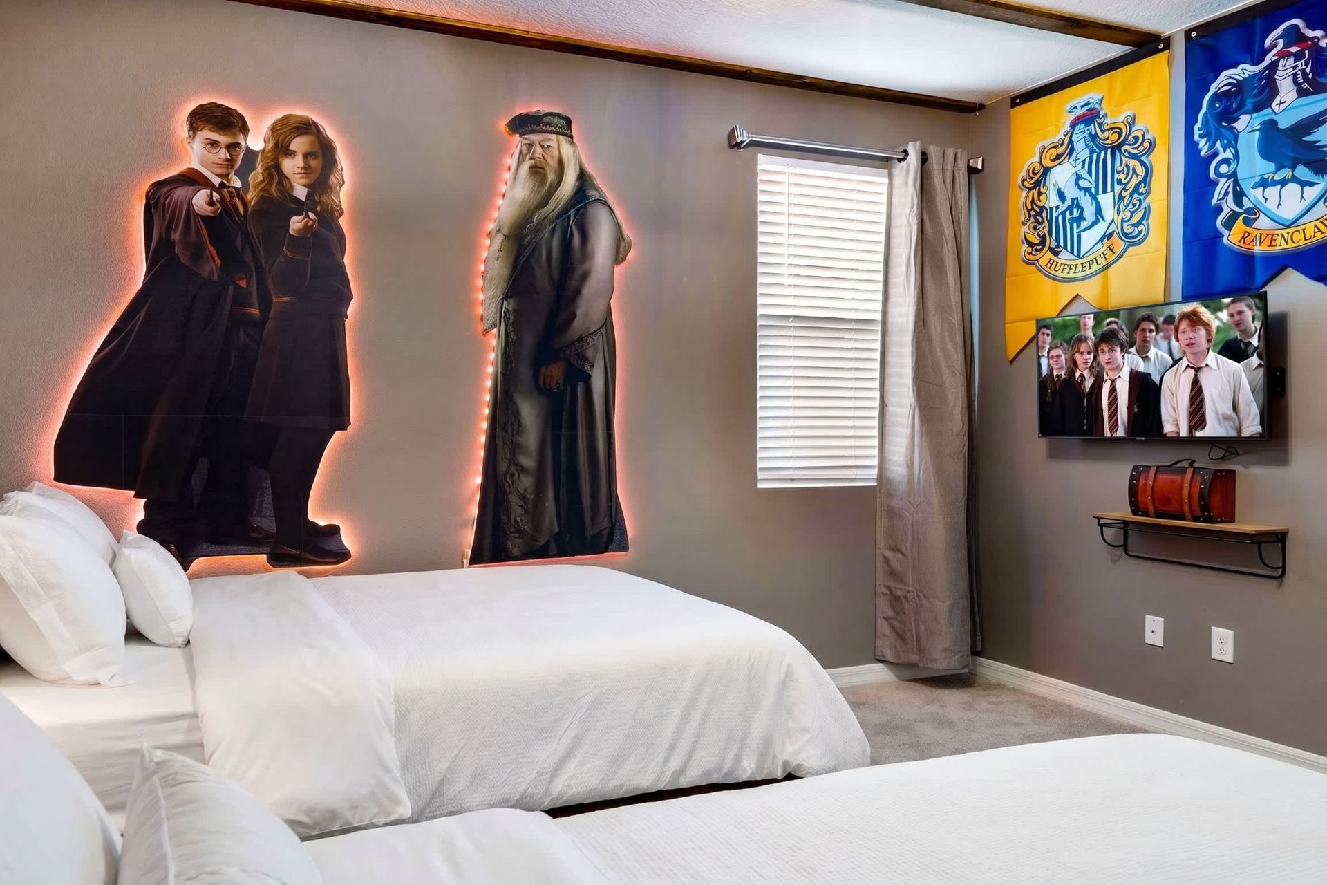 Magical wizard-themed bedroom with Hogwarts decor and cozy beds!