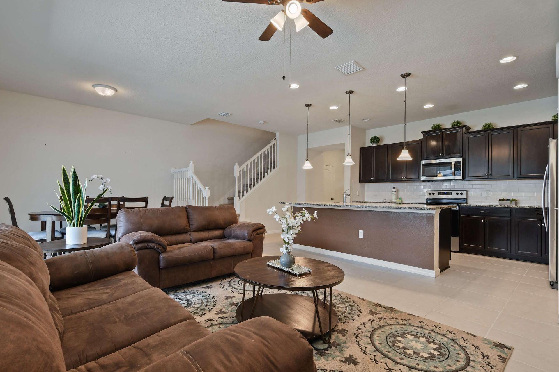Spacious open-plan living with a stylish kitchen, perfect for family gatherings.