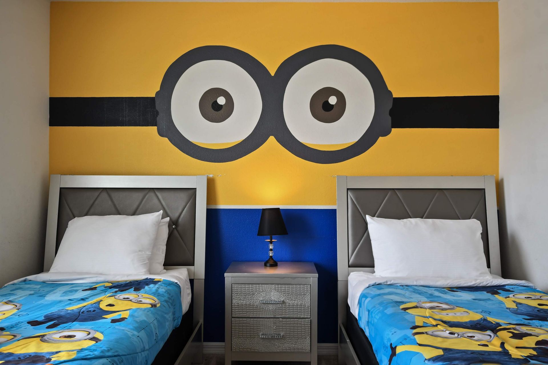 Delight the kids with this playful Minion-themed twin bedroom full of fun charm!
