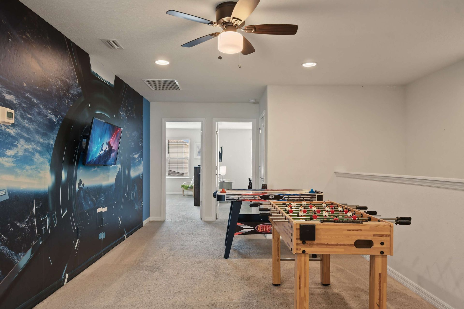 Star Wars-themed game loft with foosball, air hockey, and a fun cinematic vibe.