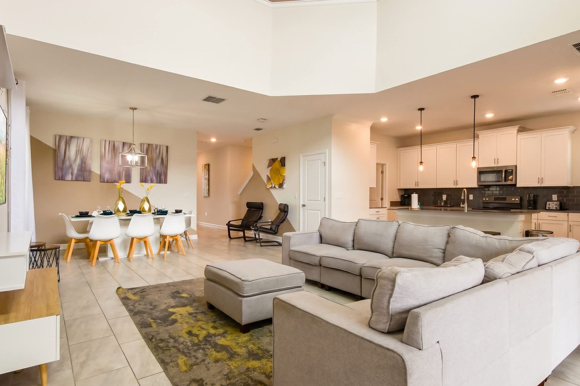 Kick back and relax in our spacious living room, where you can unwind with your favorite book or movie.