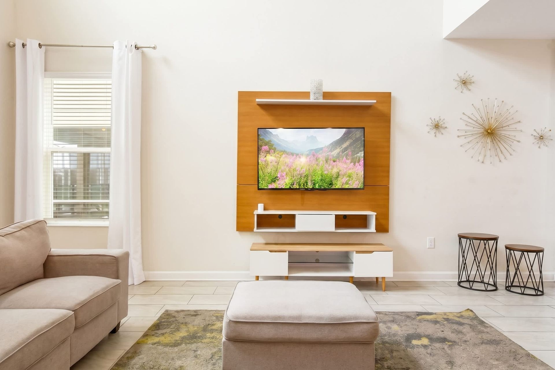 Enjoy quality time with loved ones in our inviting living room, offering a cozy space for relaxation.