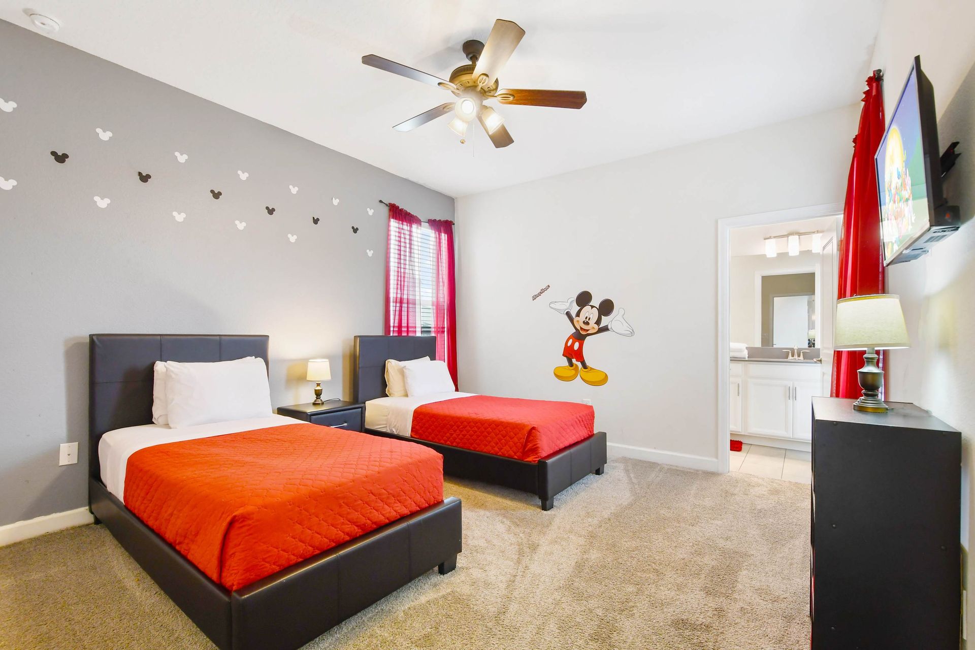 Experience a comfortable stay in our Mickey Mouse inspired room with two beds, offering you the perfect space to relax and recharge after a day of adventure.