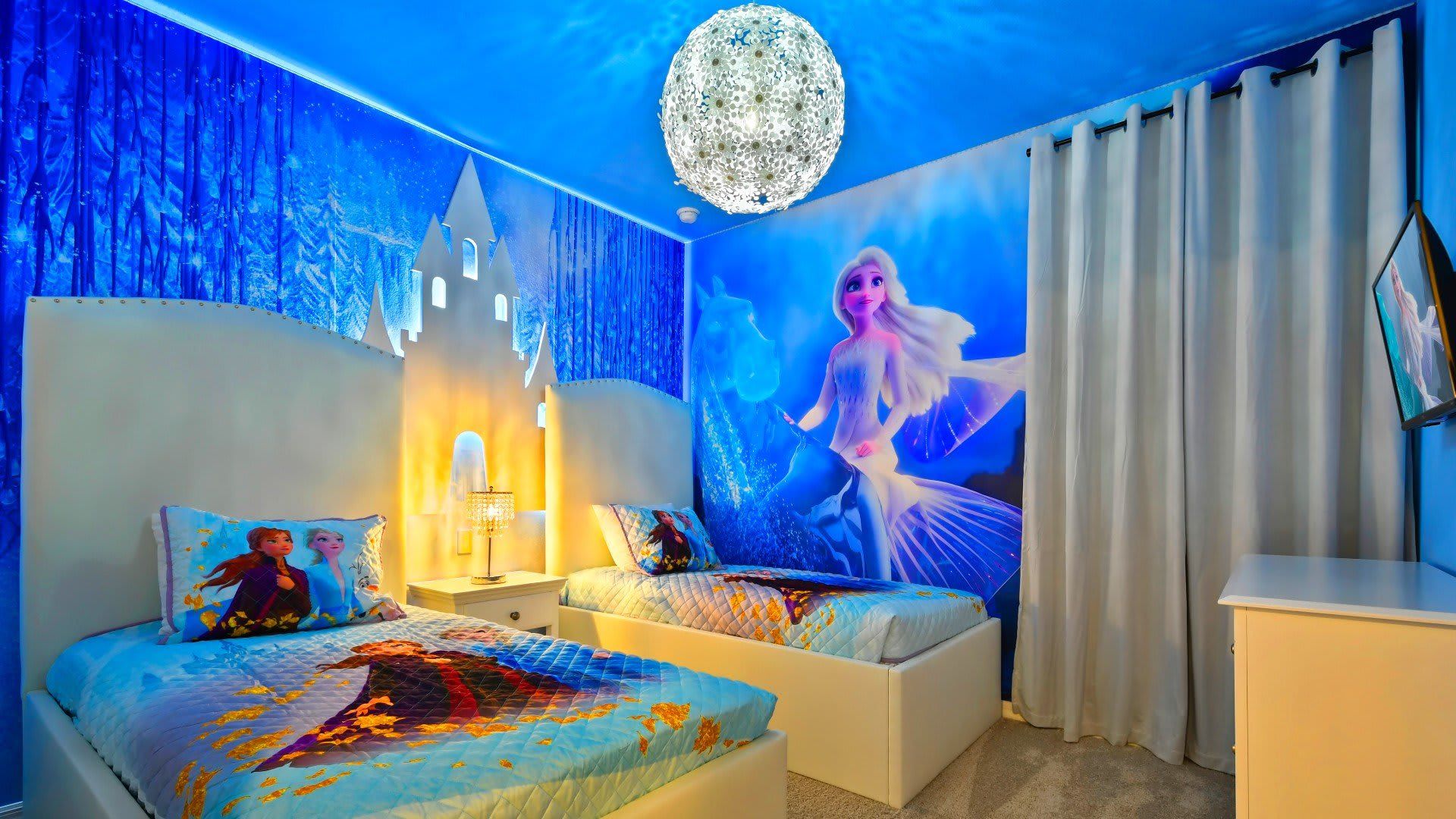 Enchanting Frozen-themed bedroom with magical decor for the ultimate kids' stay!