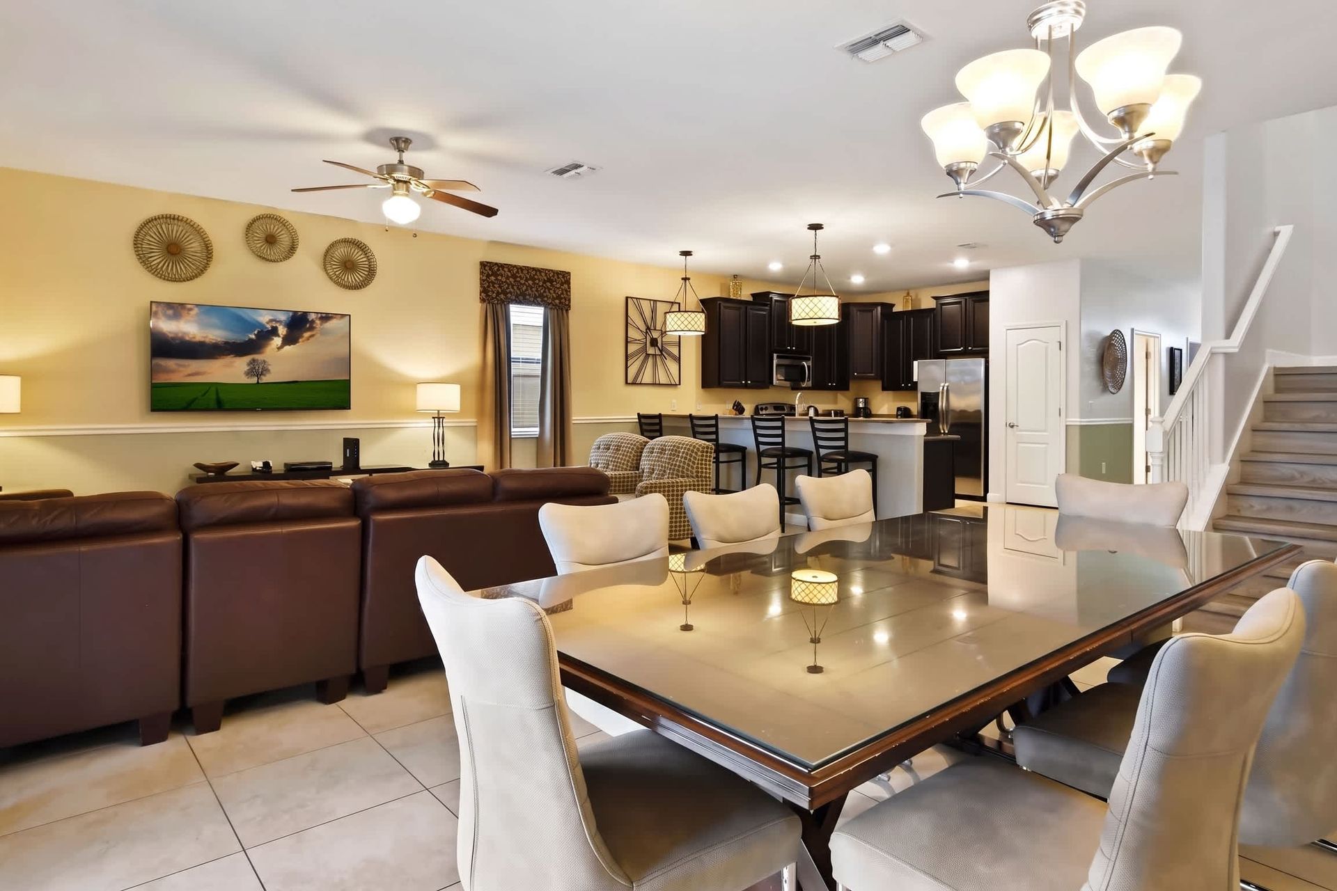 A spacious and inviting dining area featuring an elegant 8-seater dining table.