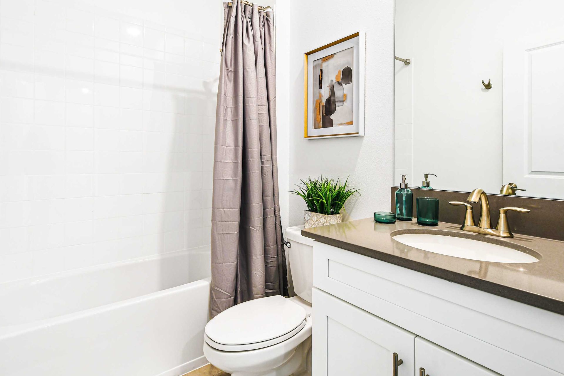 Indulge in luxury in our well-appointed bathroom, providing you with all the amenities you need for a comfortable stay.