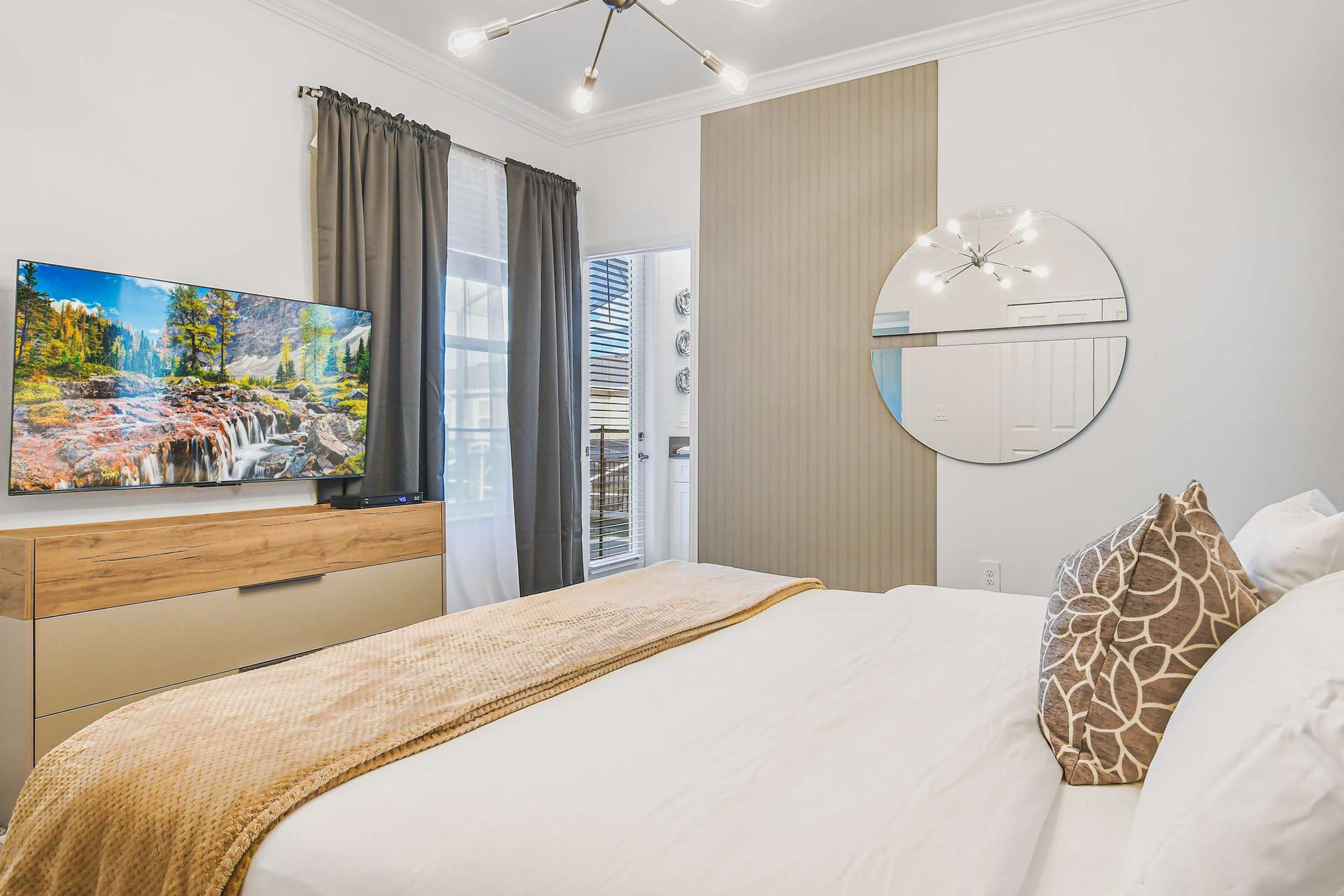 Enjoy a peaceful night's sleep in our charming bedroom, offering you comfort and tranquility.