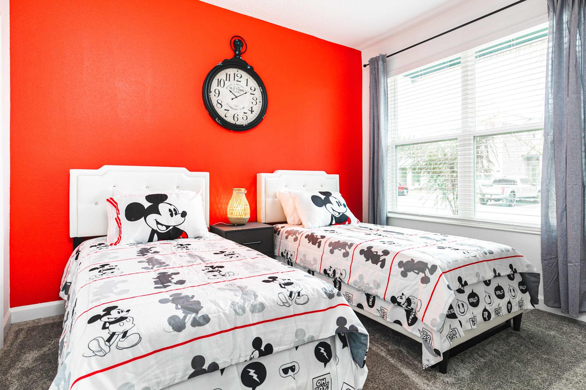 Enjoy the flexibility and comfort of our Mickey Mouse themed room with two twin beds, providing you with a cozy and restful retreat during your stay.