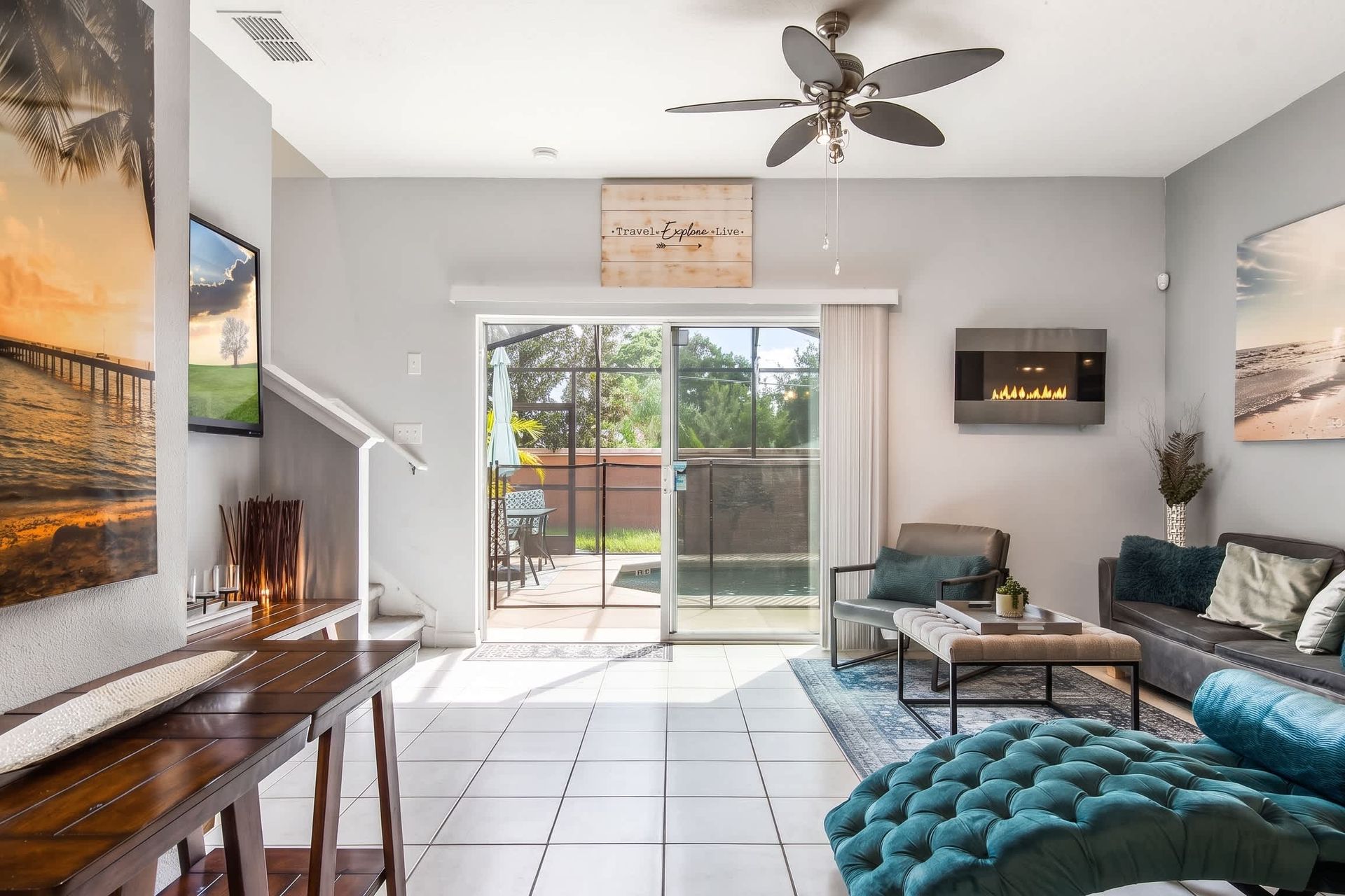 Cozy living space with modern touches, fireplace, and patio views!