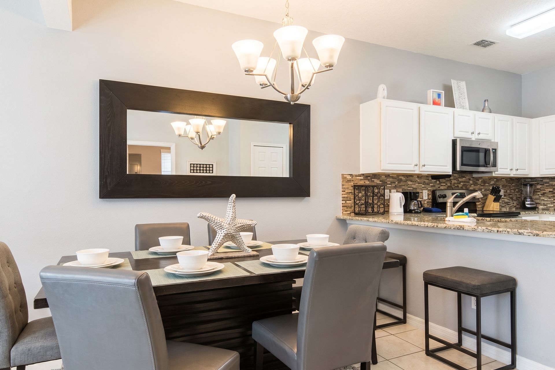 Stylish dining area with modern decor, perfect for cozy meals!