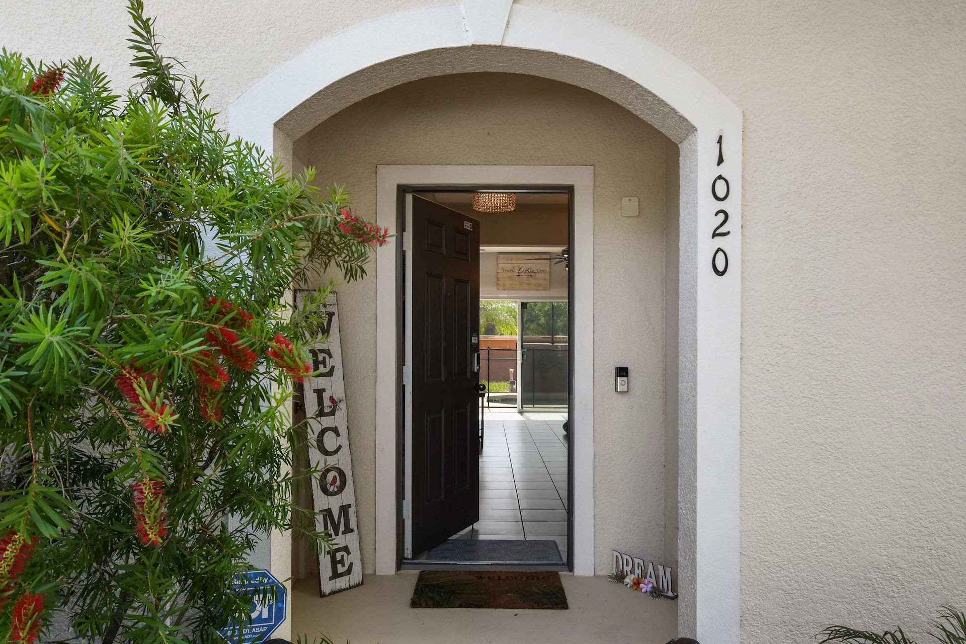 Welcoming entrance with charming decor and a view into your retreat!