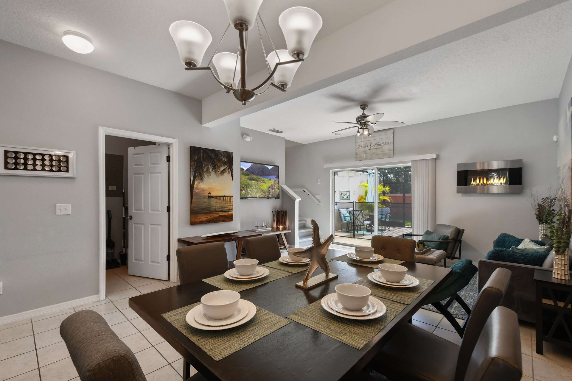 Spacious dining area flowing into a stylish living room with patio!