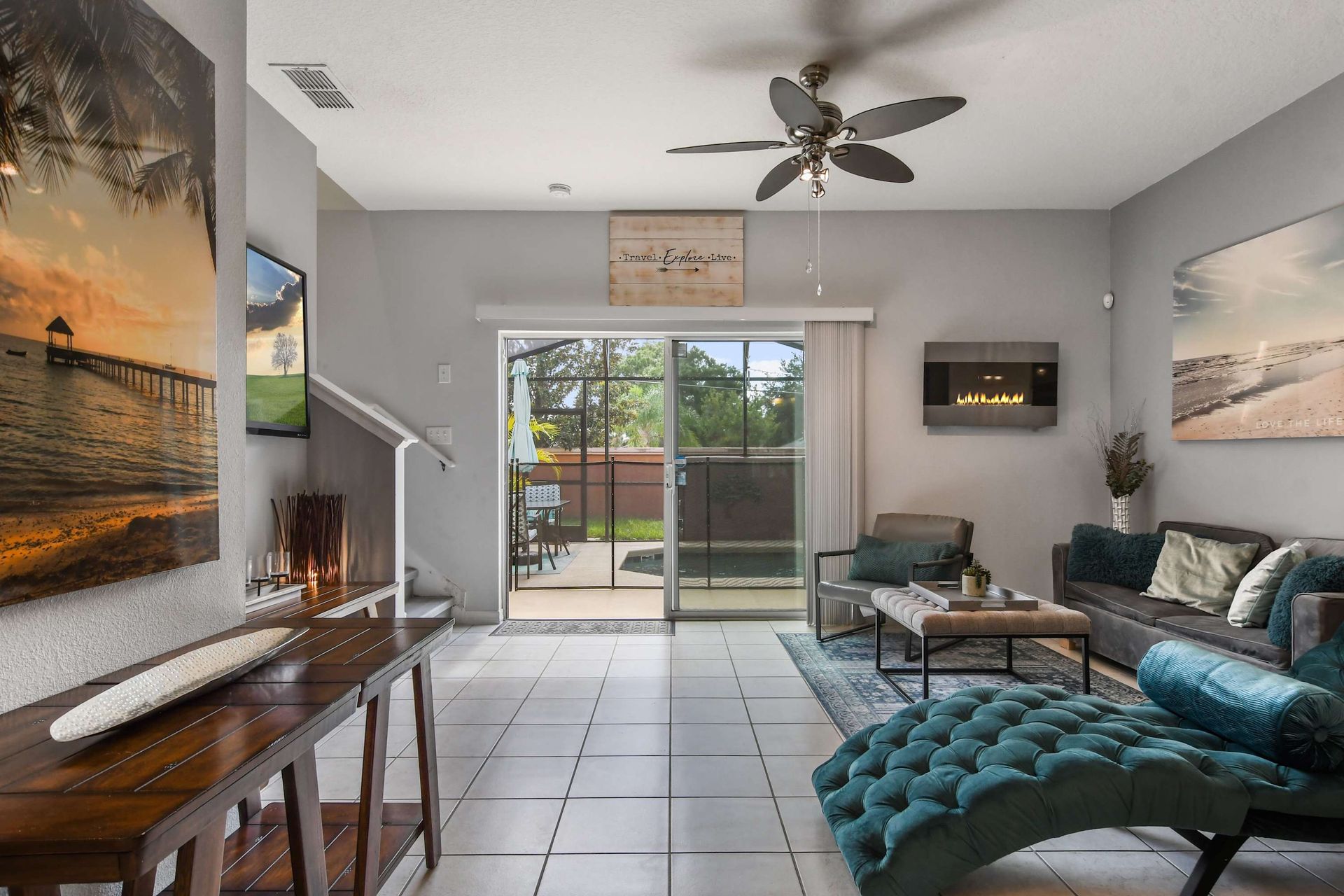 Cozy living space with modern touches, fireplace, and patio views!