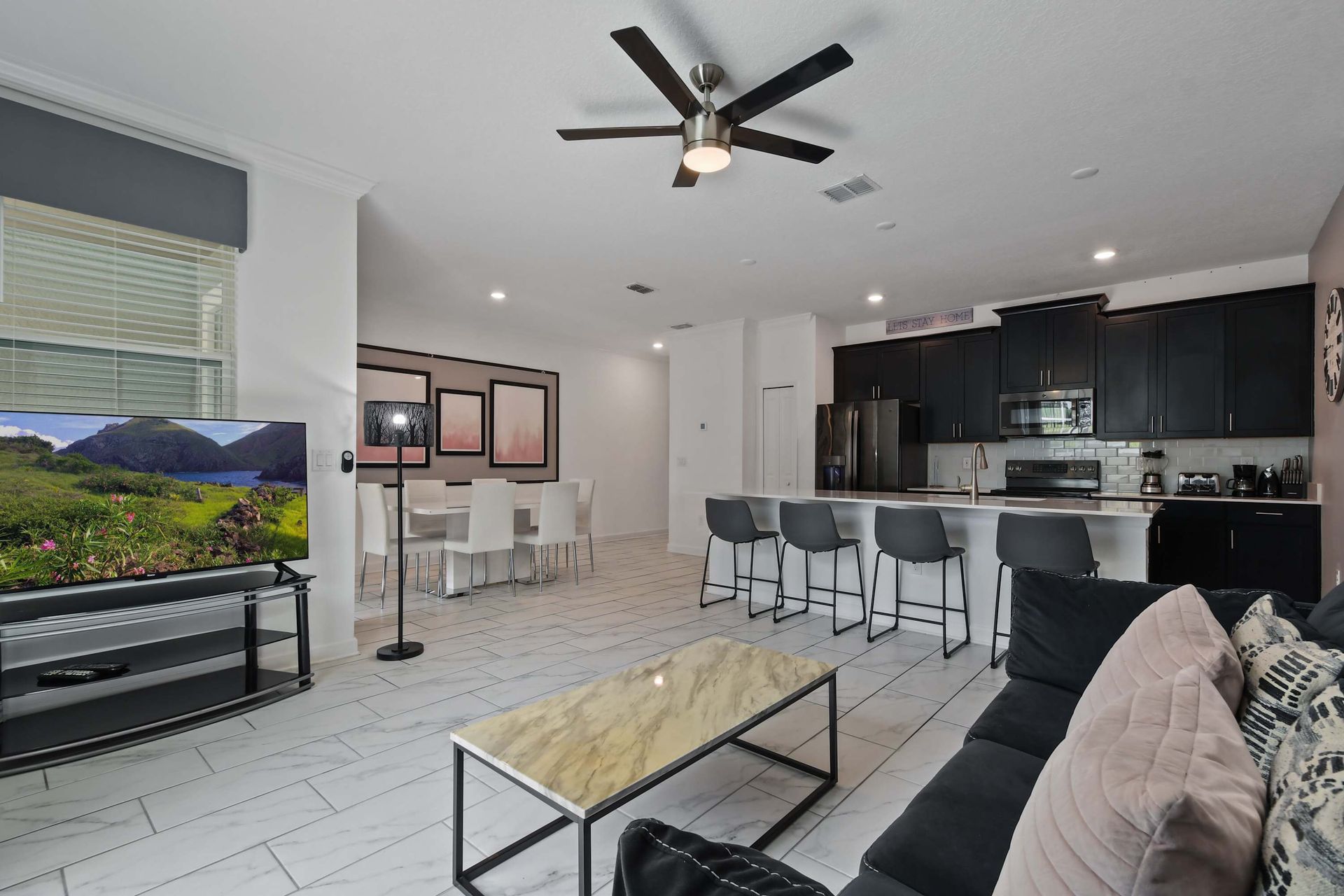 Open-Concept Living: Modern Kitchen, Dining & Relaxation Space!