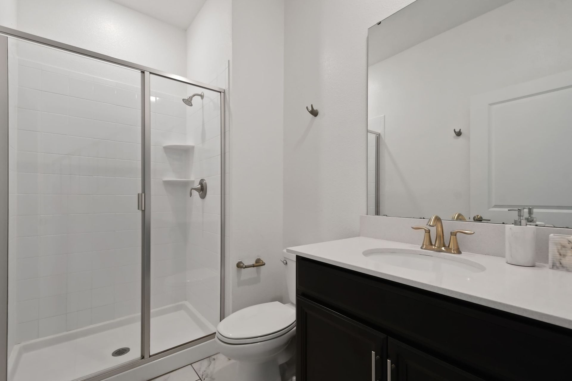 Elegant Bathroom w/ single Sink & Modern Touches!