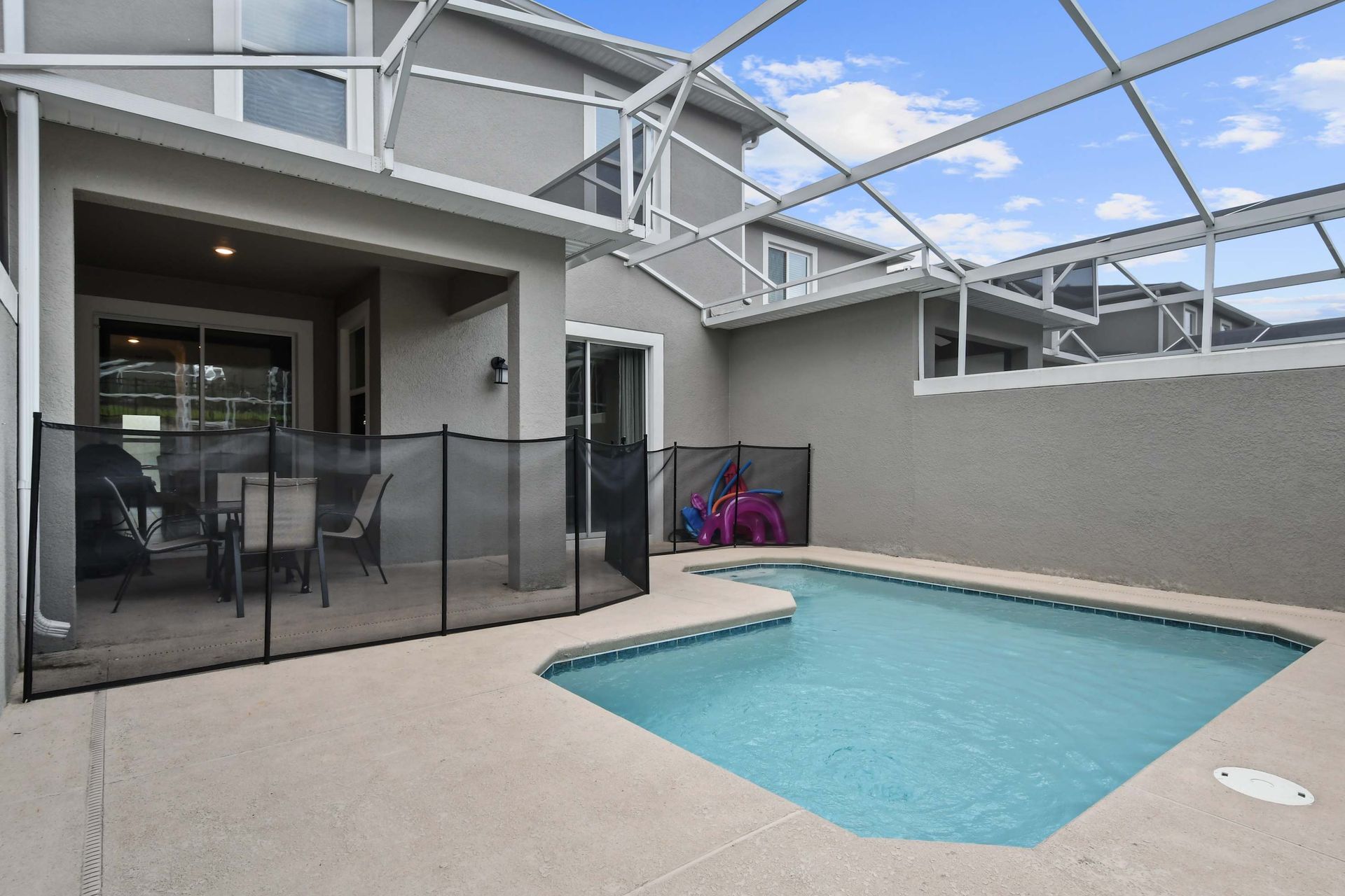 Family-Friendly Pool Area w/ Safety Fence & Covered Patio Seating!